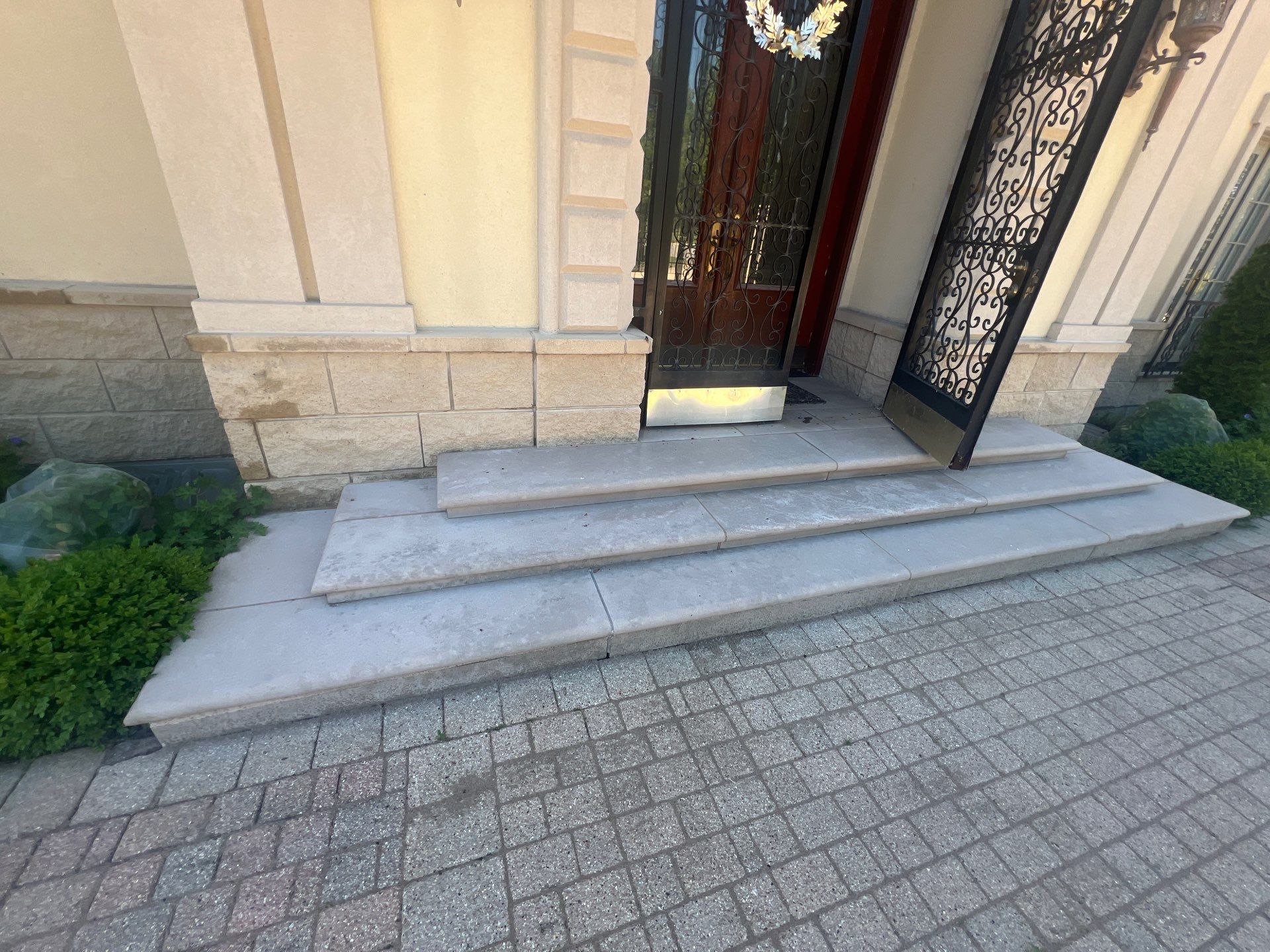concrete cleaning using Algaecide, soft wash soap by Northern Power Washing LLC.