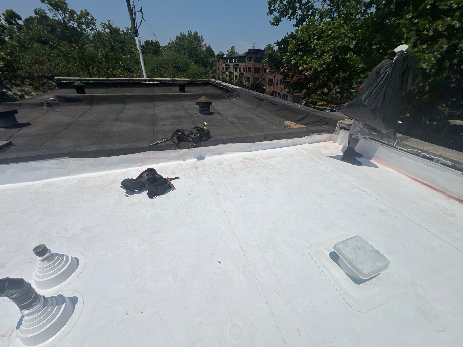 Townhouse Flat Roof Replacement using Carlisle TPO System by USA Storm Roofing and Construction Group