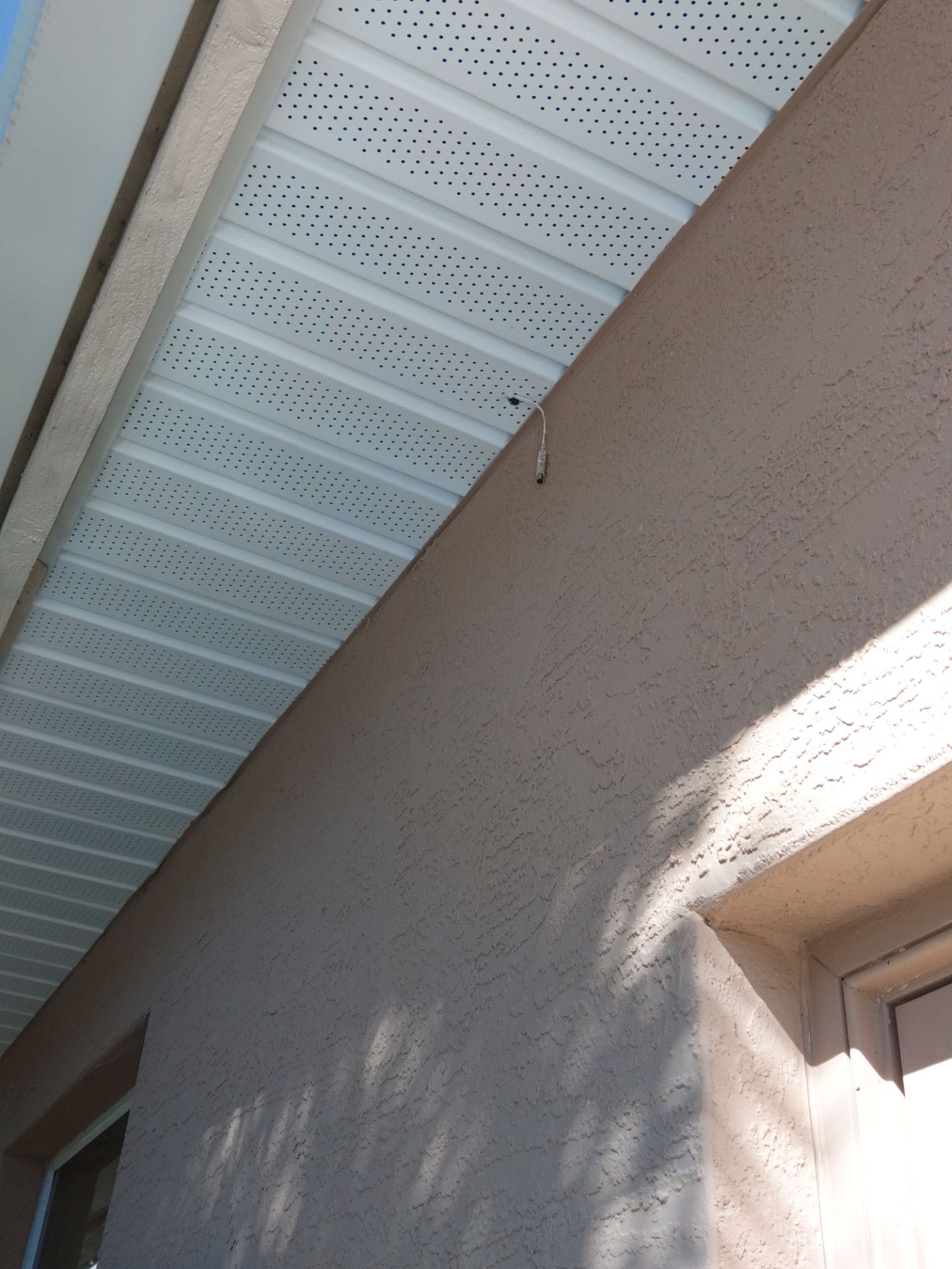 White Soffit and Fascia Installation for Coastal Homes in Sarasota FL by Gutter Professors