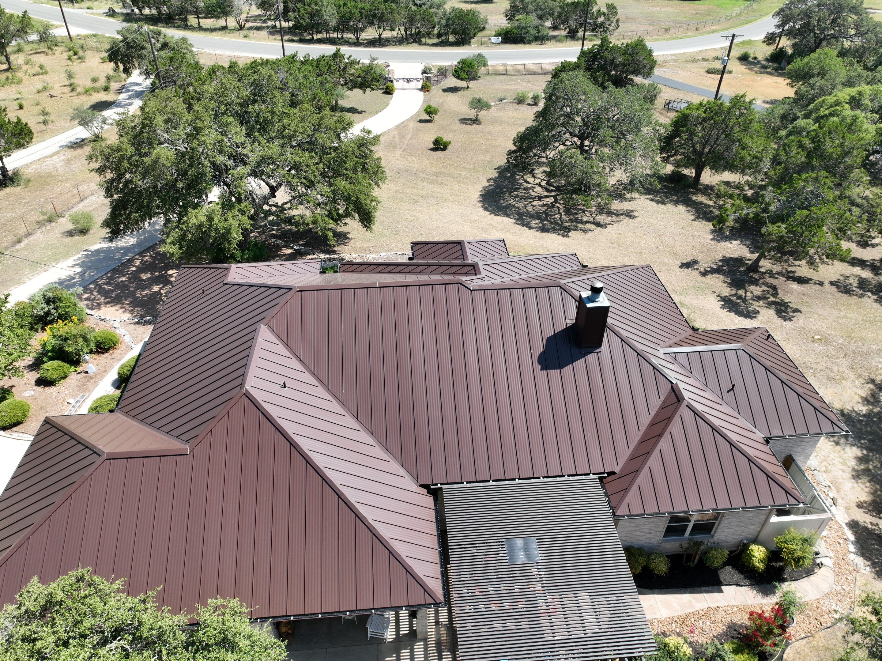 Residential Metal Roof Installation using McElroy Metal by Premier Roofing and Contracting