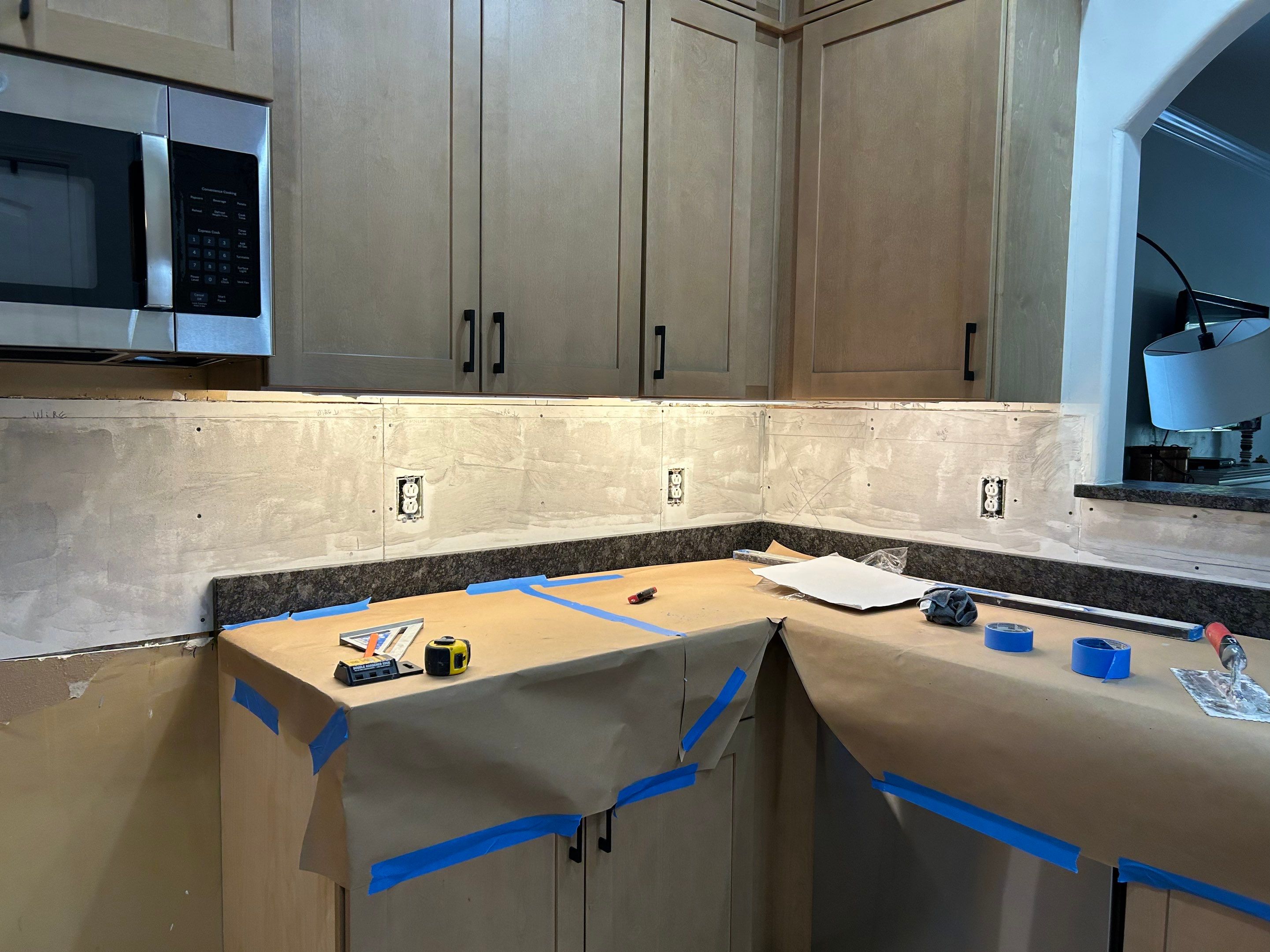 Hexagonal Marble Backsplash  by Footprints Floors of Nashville