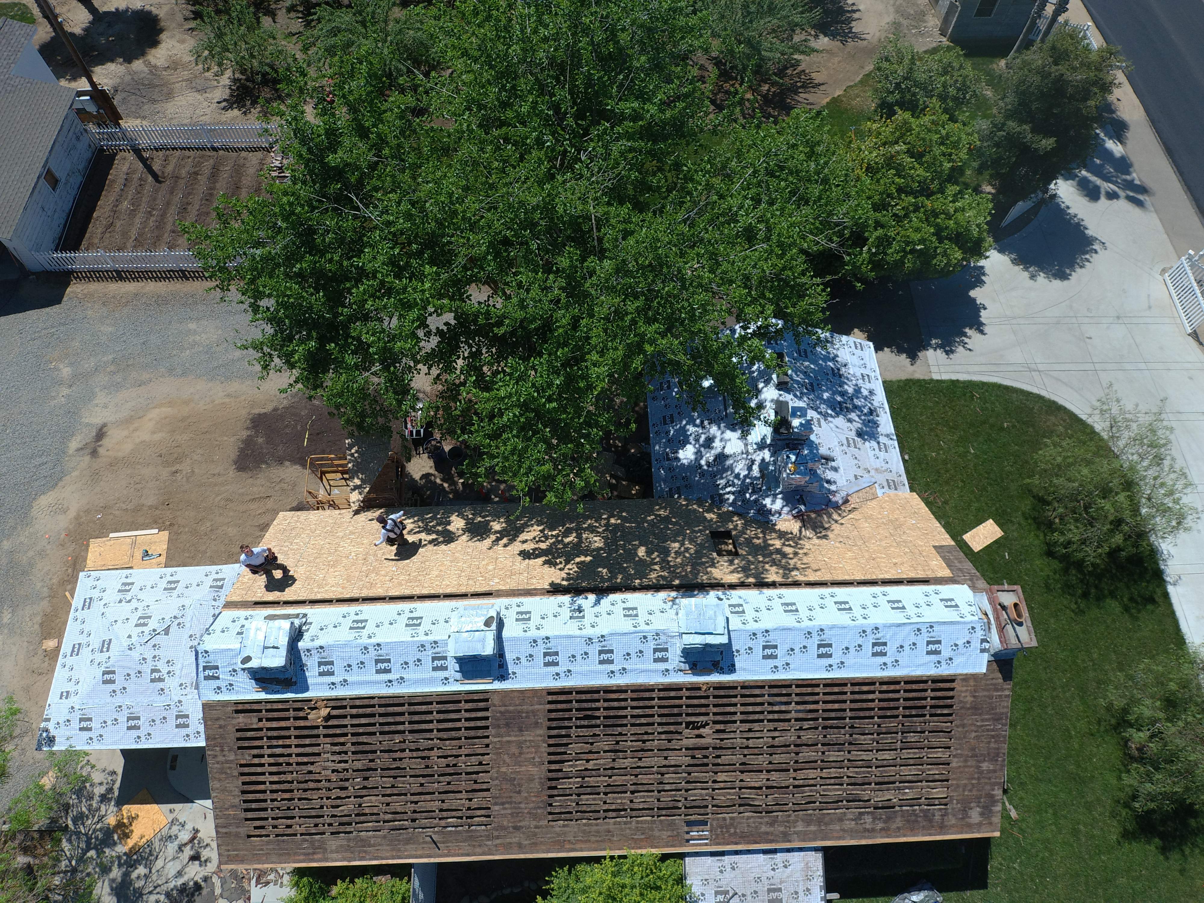 Residential Roofing Installation using Presidential type composition shingles by Straight Edge Roofing Inc