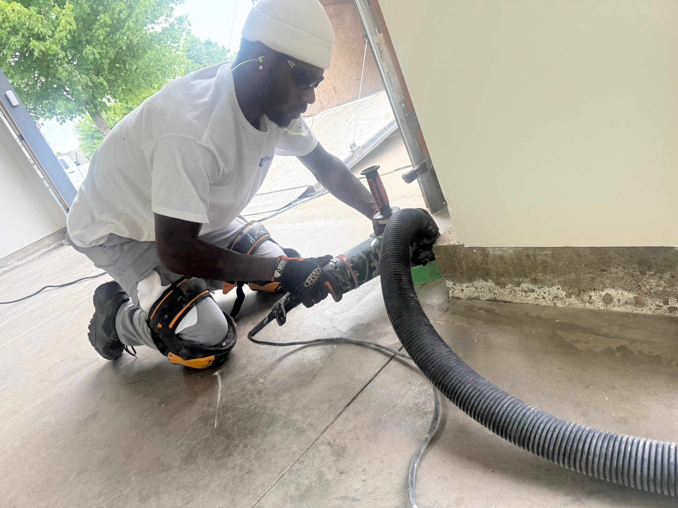 Full Garage Floor Resurfacing and Decorative Epoxy Flake Finish by Select Painting, Coatings & Garage Cabinets