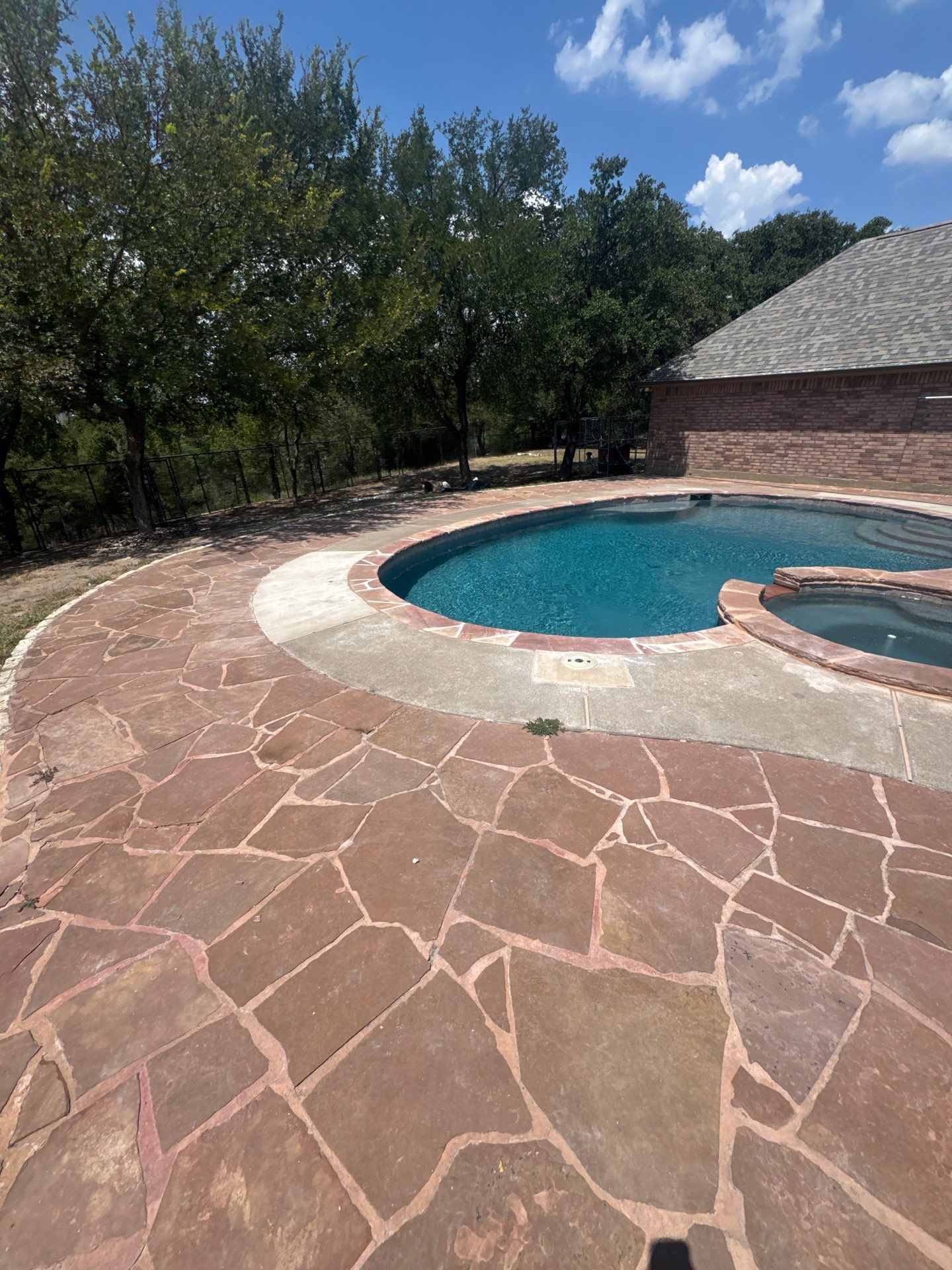 Freeform Pool and Spa Remodel with Flagstone Deck by Pinnacle Pools and Spas - DFW