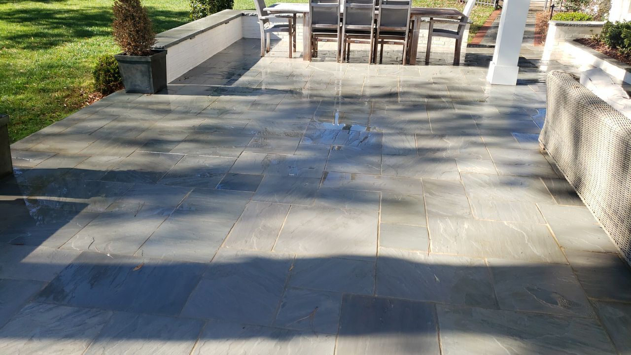 Sara Gutter cleanout using water by G&H Home Tech Pros LLC