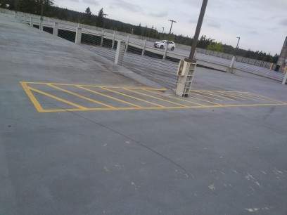 Corti Construction | Striping for Concrete Parking Lot by Jireh Asphalt & Concrete Inc 