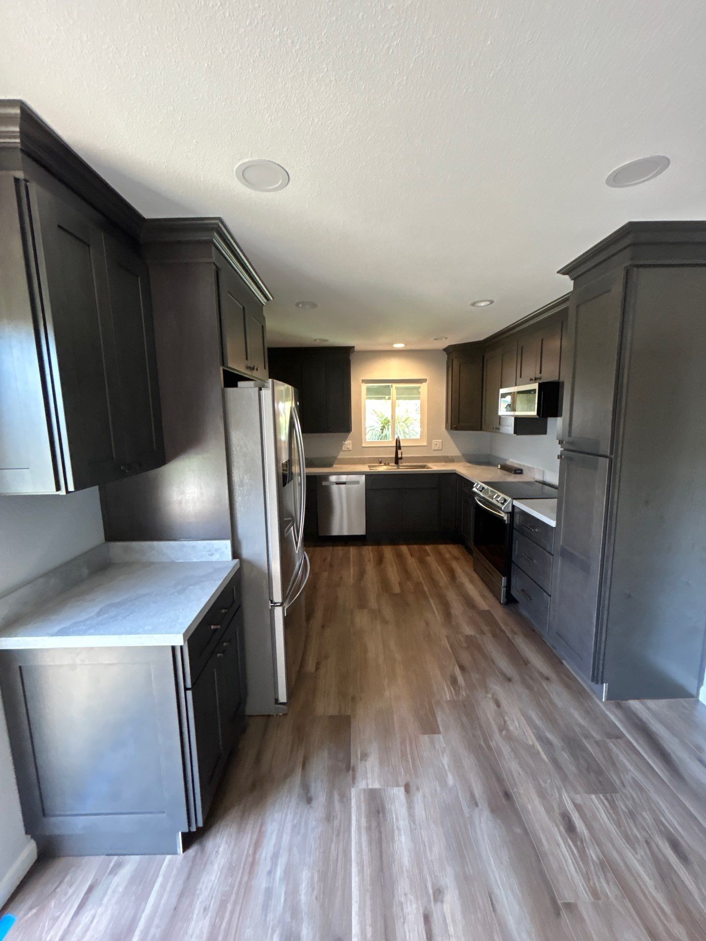 Modern Kitchen Remodel by H4H Remodeling and Repairs Inc.