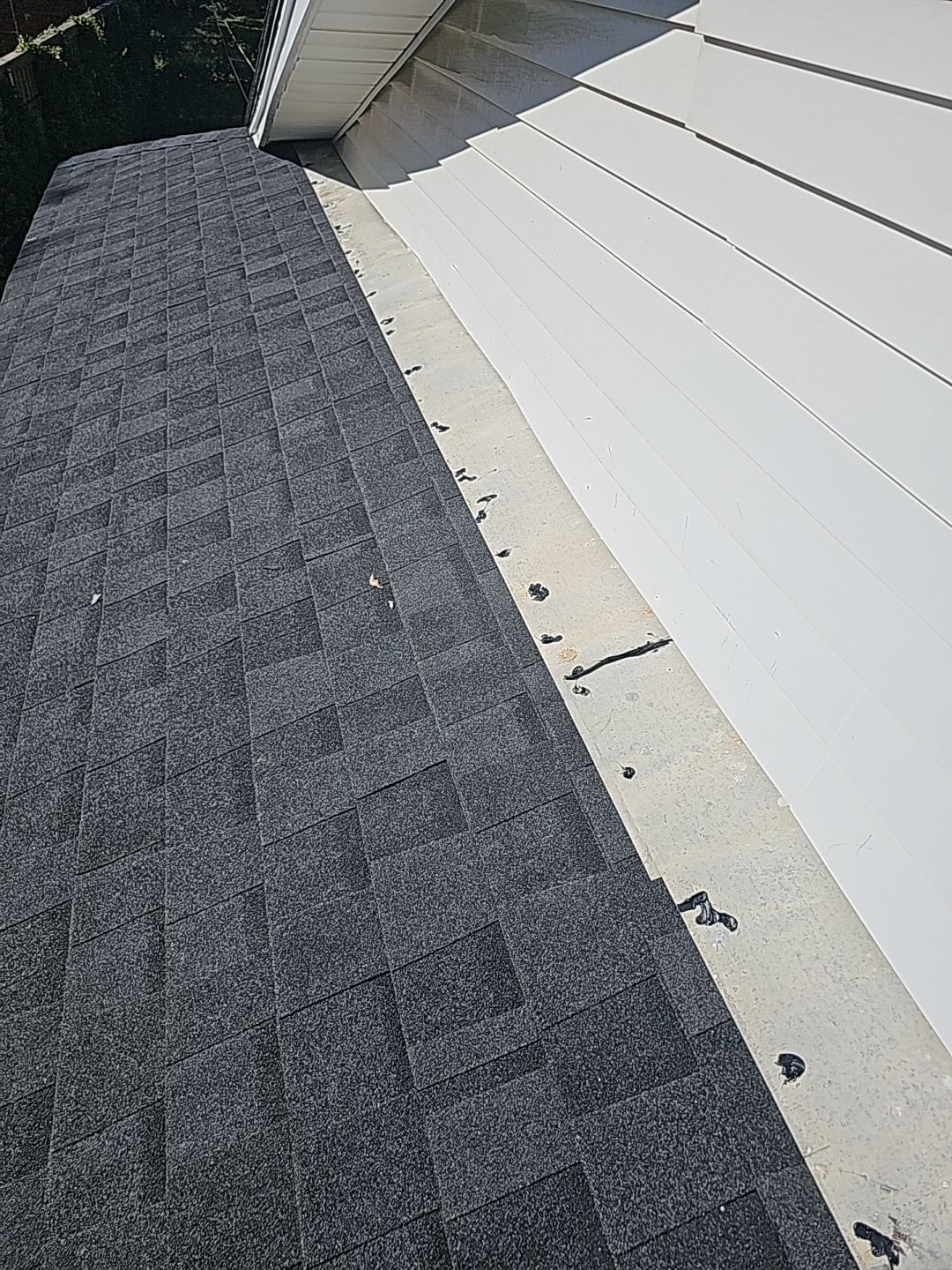 "Full Roof Replacement Due to Hail and Water Damage – Before & After" by road roofing llc