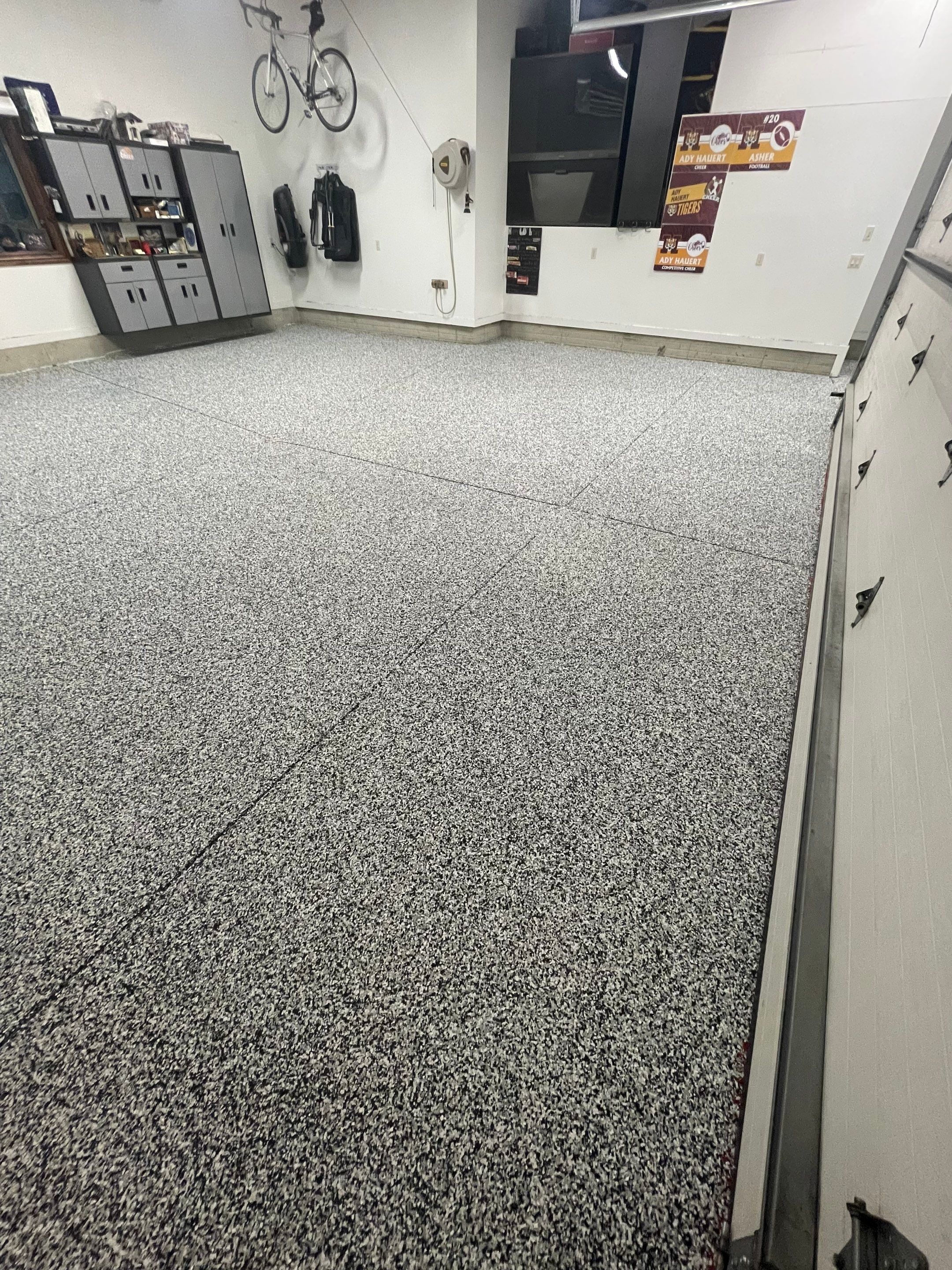 Garage Floor Coating and Domino Flake Finish in Sioux Falls by Select Painting, Coatings & Garage Cabinets