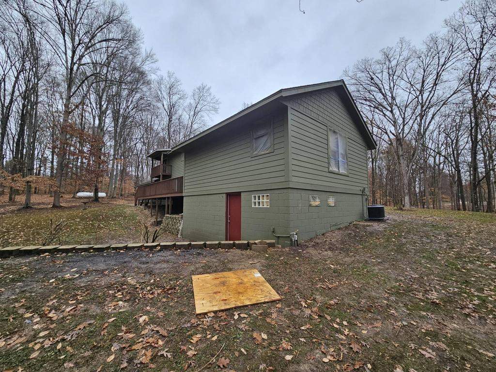 Siding Installation using Primed James Hardie & Straight Edge Shakes by Koontz Construction