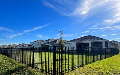 Aluminum Fence Installation using Black 3 Rail Aluminum Fence