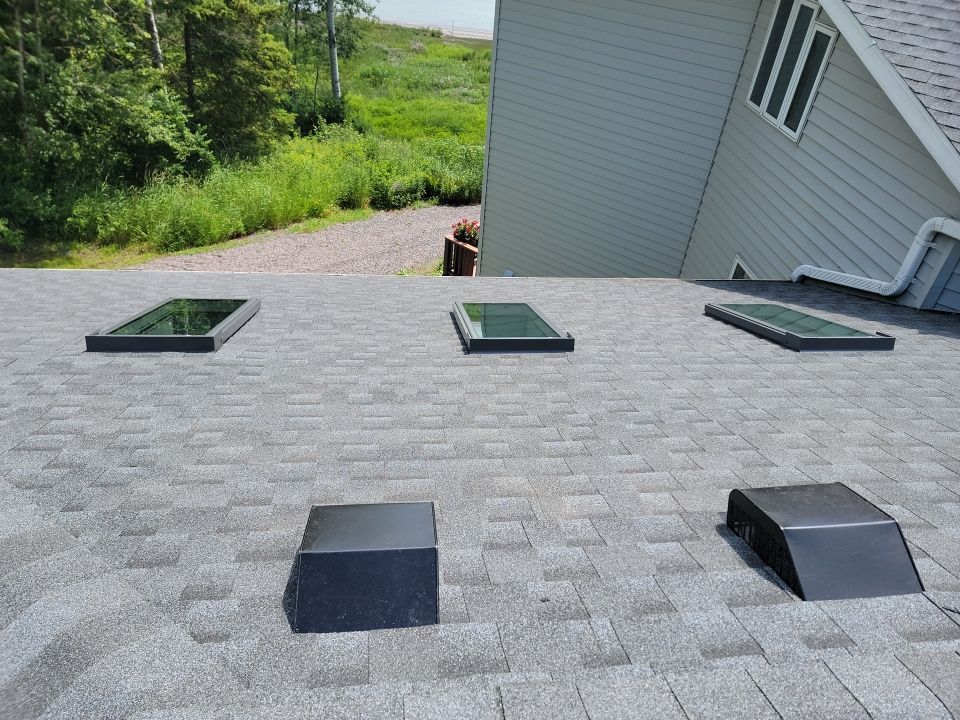 Roof Installation with GAF HDZ Timberline Shingles and Skylight Replacement in Cleveland, WI by Gellings Roofing and Siding LLC