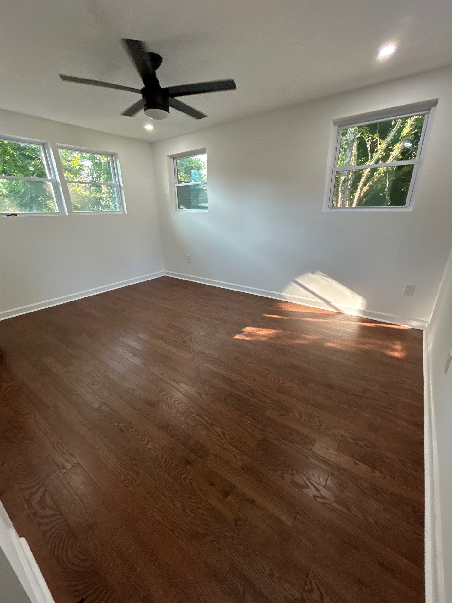 Replaced LVP with timeless solid oak by Footprints Floors of East Atlanta