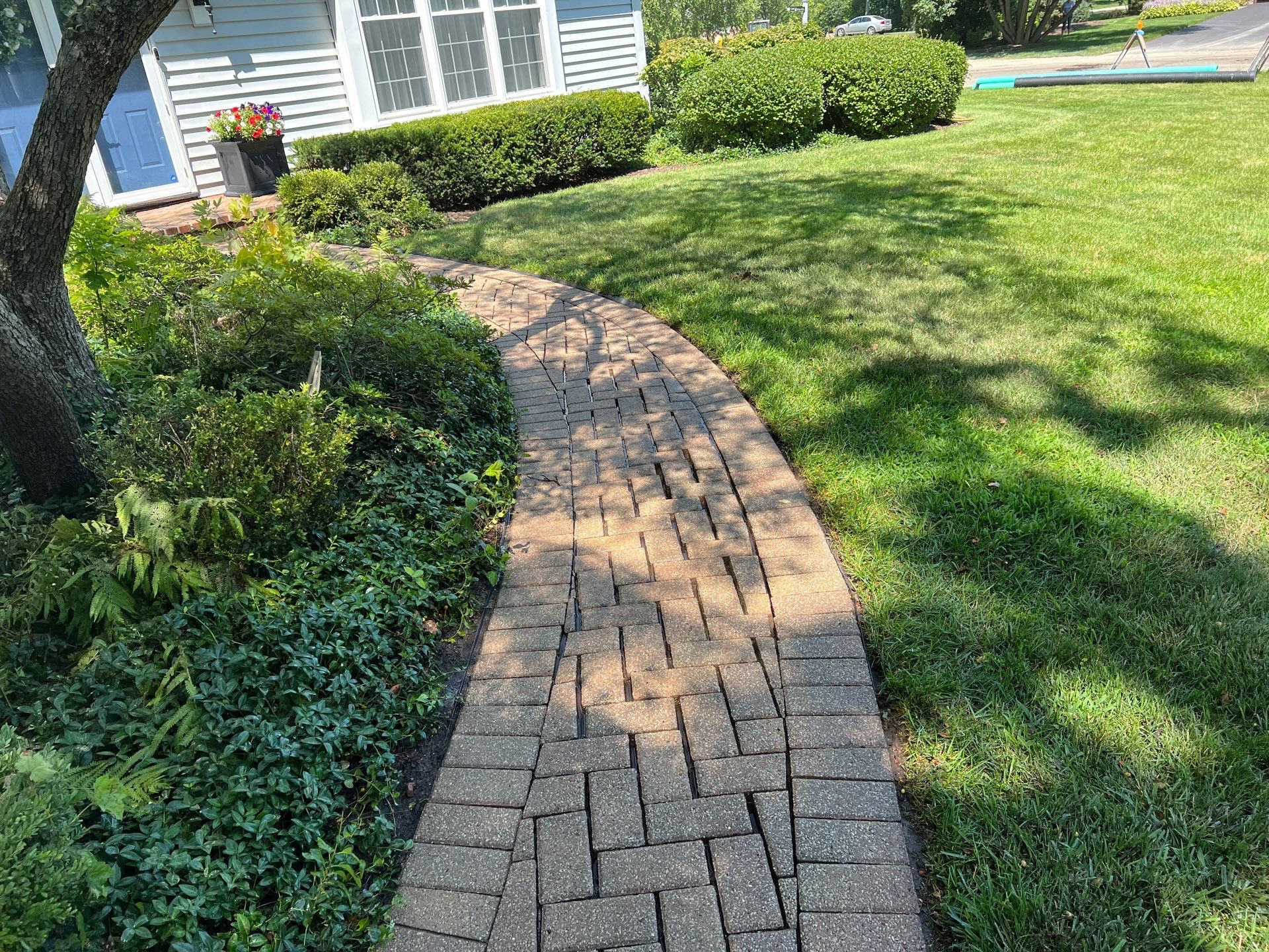 Brick paver clean, sand and seal.  using Polysweep polymeric sand by Northern Power Washing LLC.