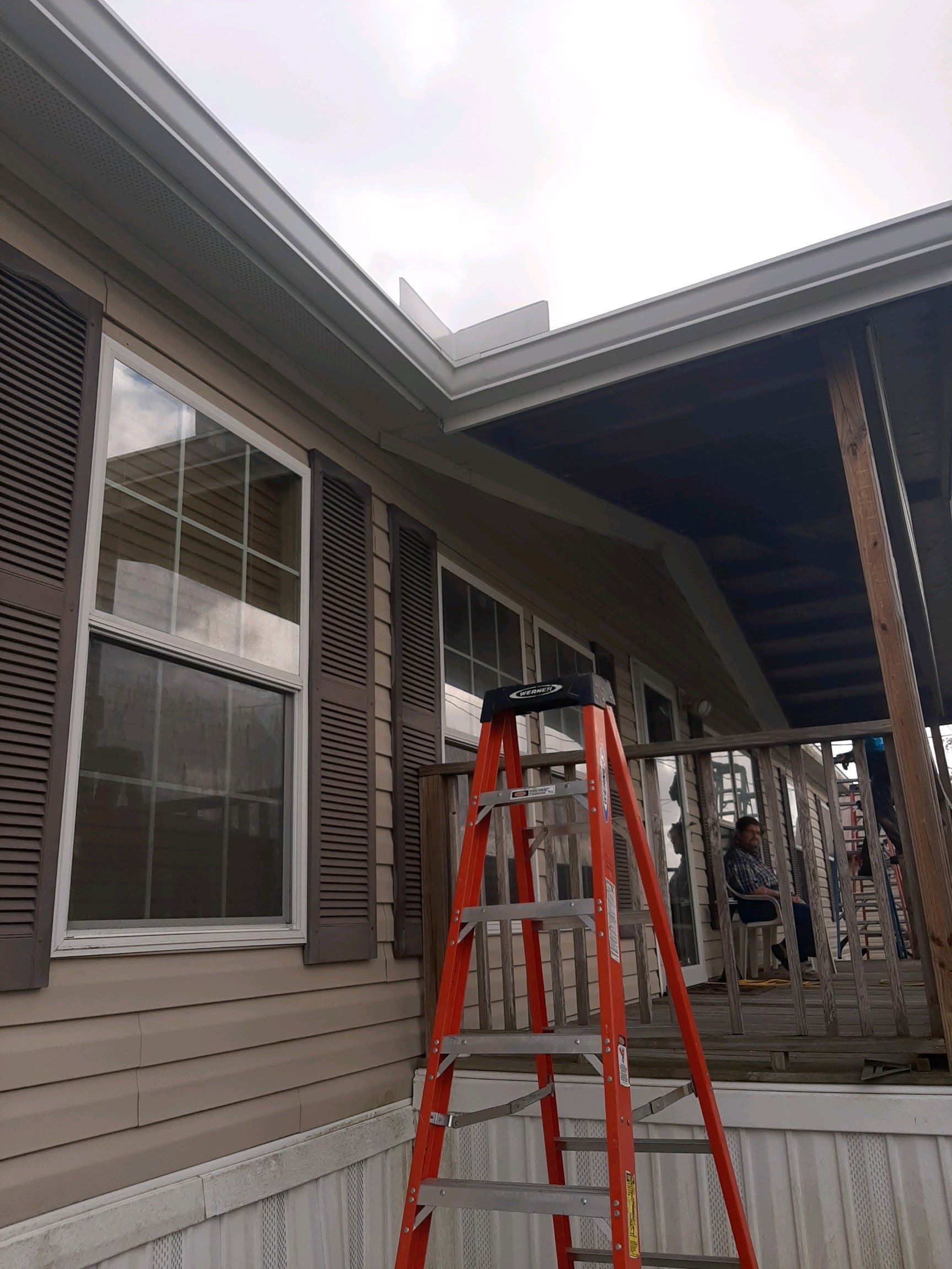 Gutter Installation using White Seamless Gutters by Gutter Professors