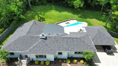 Residential Roofing Installation using GAF Timberline HDZ and Standing Seam Metal