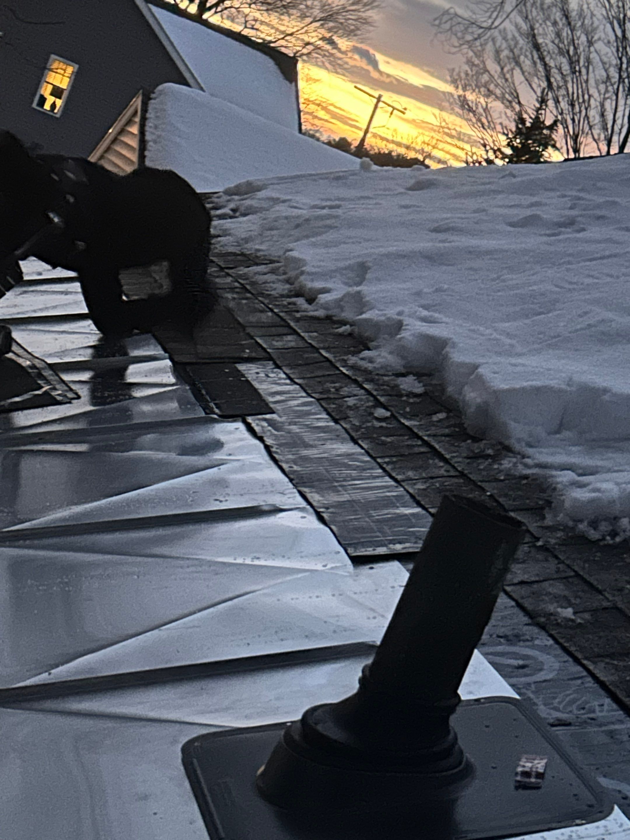 Snow/Ice Belt & Ice Dam Removal Project in Woburn by Mighty Dog Roofing of Greater Middlesex County