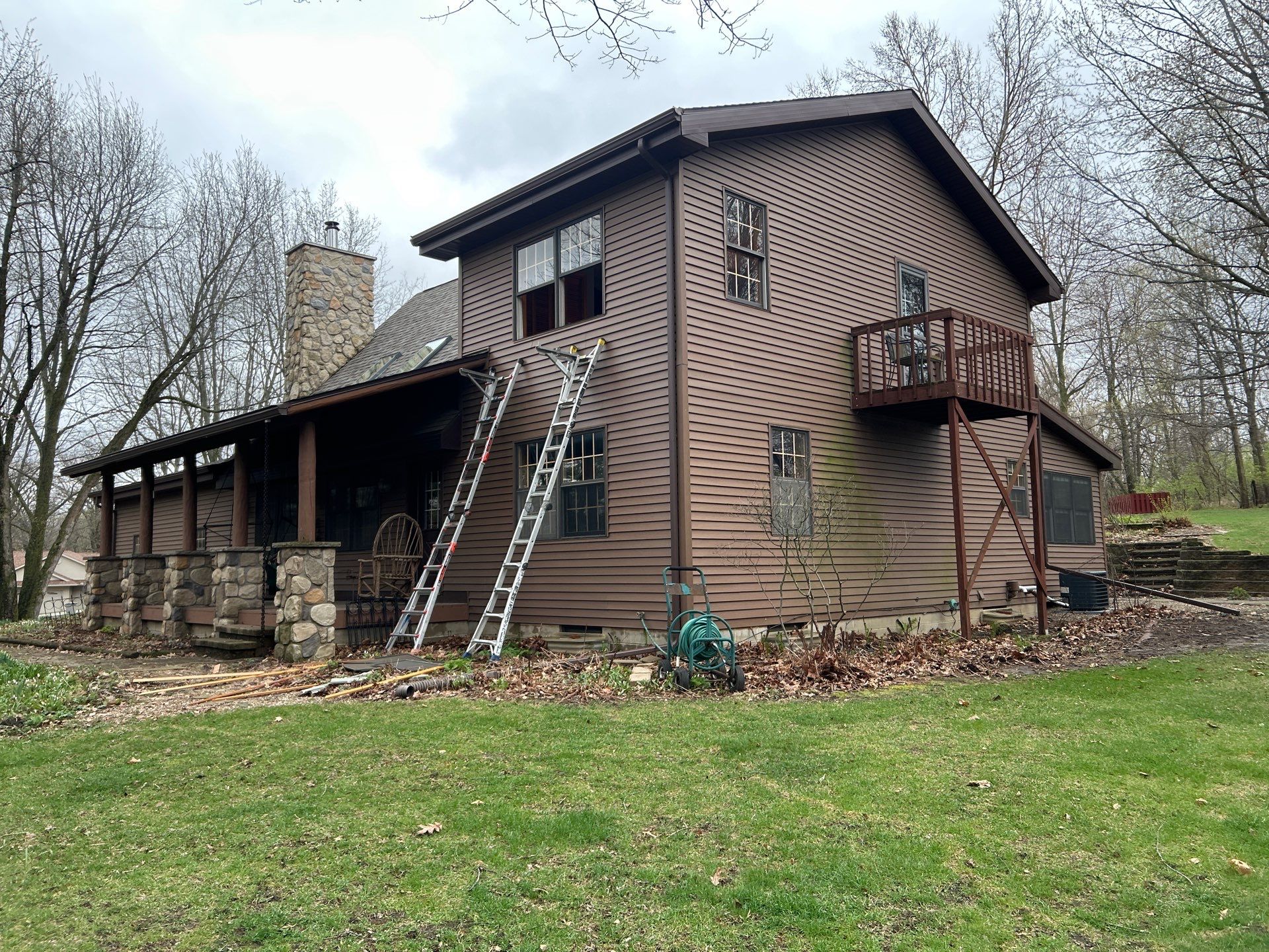 Pella Window installation using Pella Lifestyle wood/Aluminum window by United Windows and Siding LLC