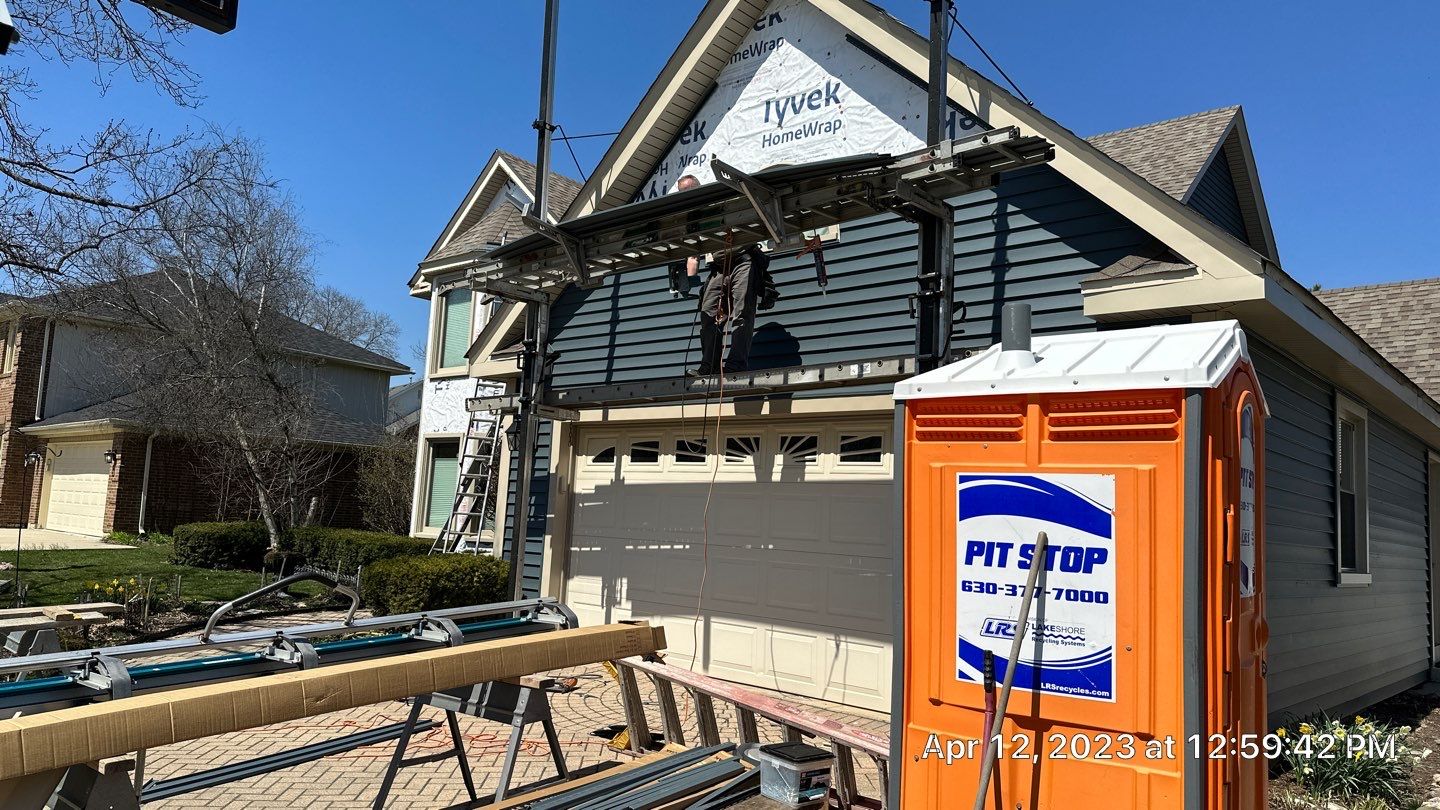Siding Installation using Alside Charter Oak by Pro Home Services Inc