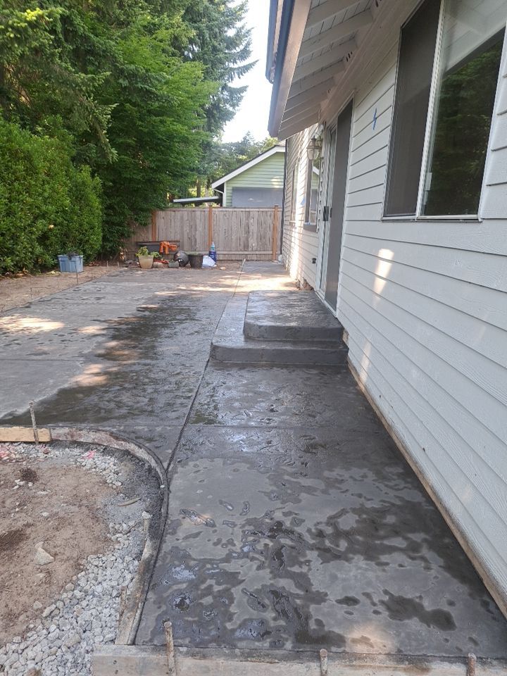 Luo | Colored Stamped Concrete Patio by Jireh Asphalt & Concrete Inc 