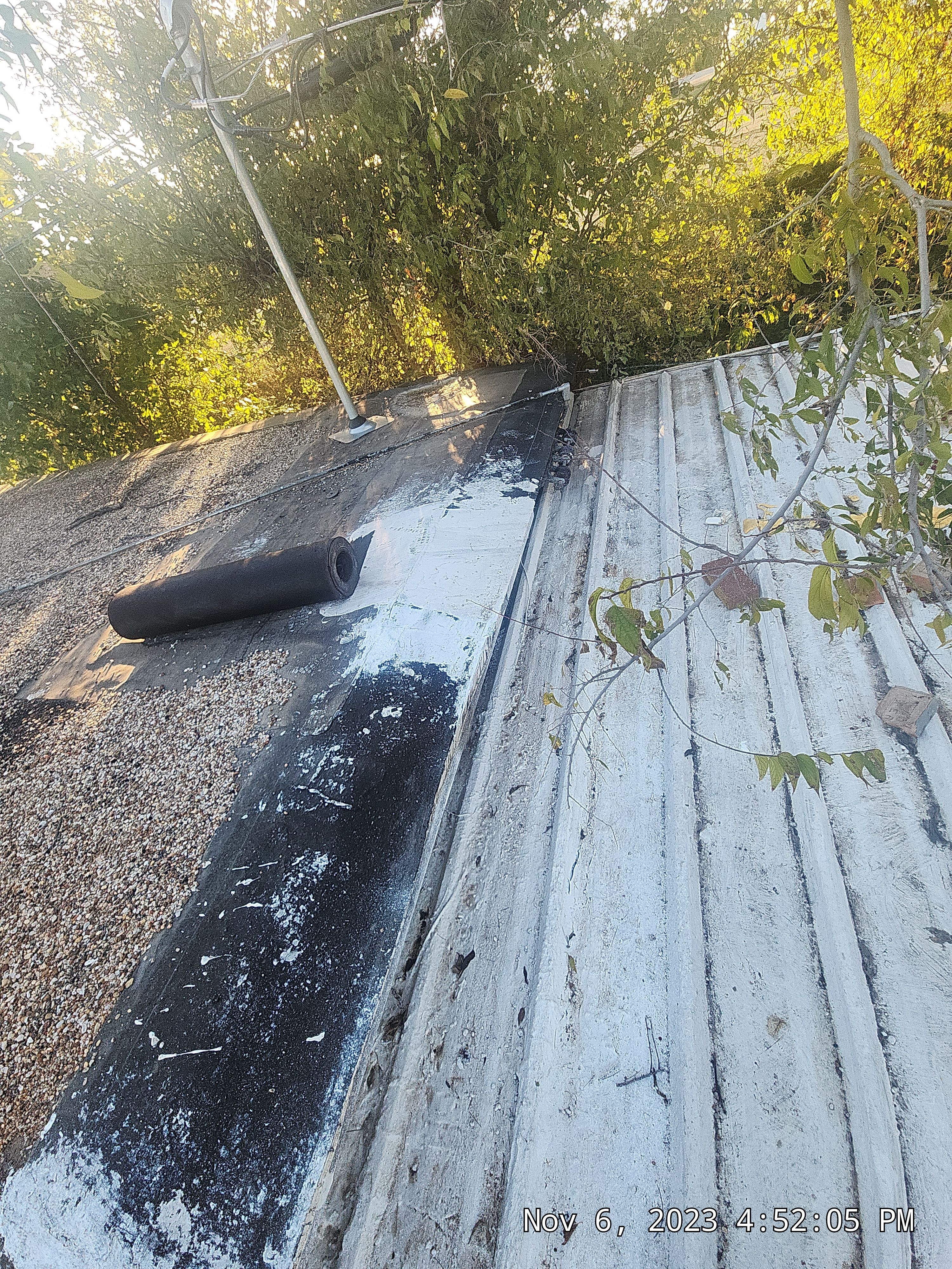 Commercial roofing overlay using GAF TPO over an old ballast roof by Becker Roofing and Exteriors