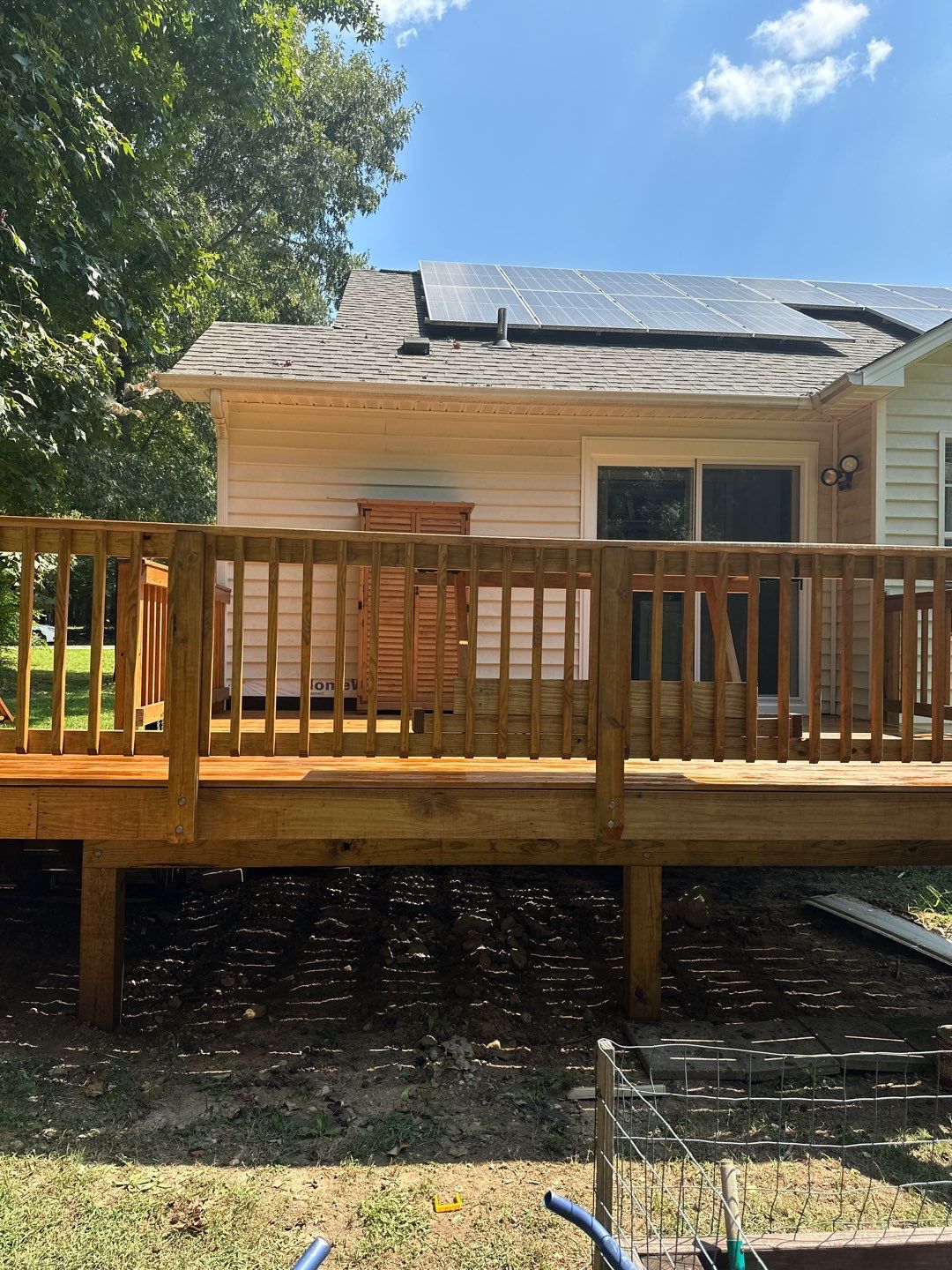 Deck Expansion and Sliding Glass Door Installation in Clayton by The Remodeling Company