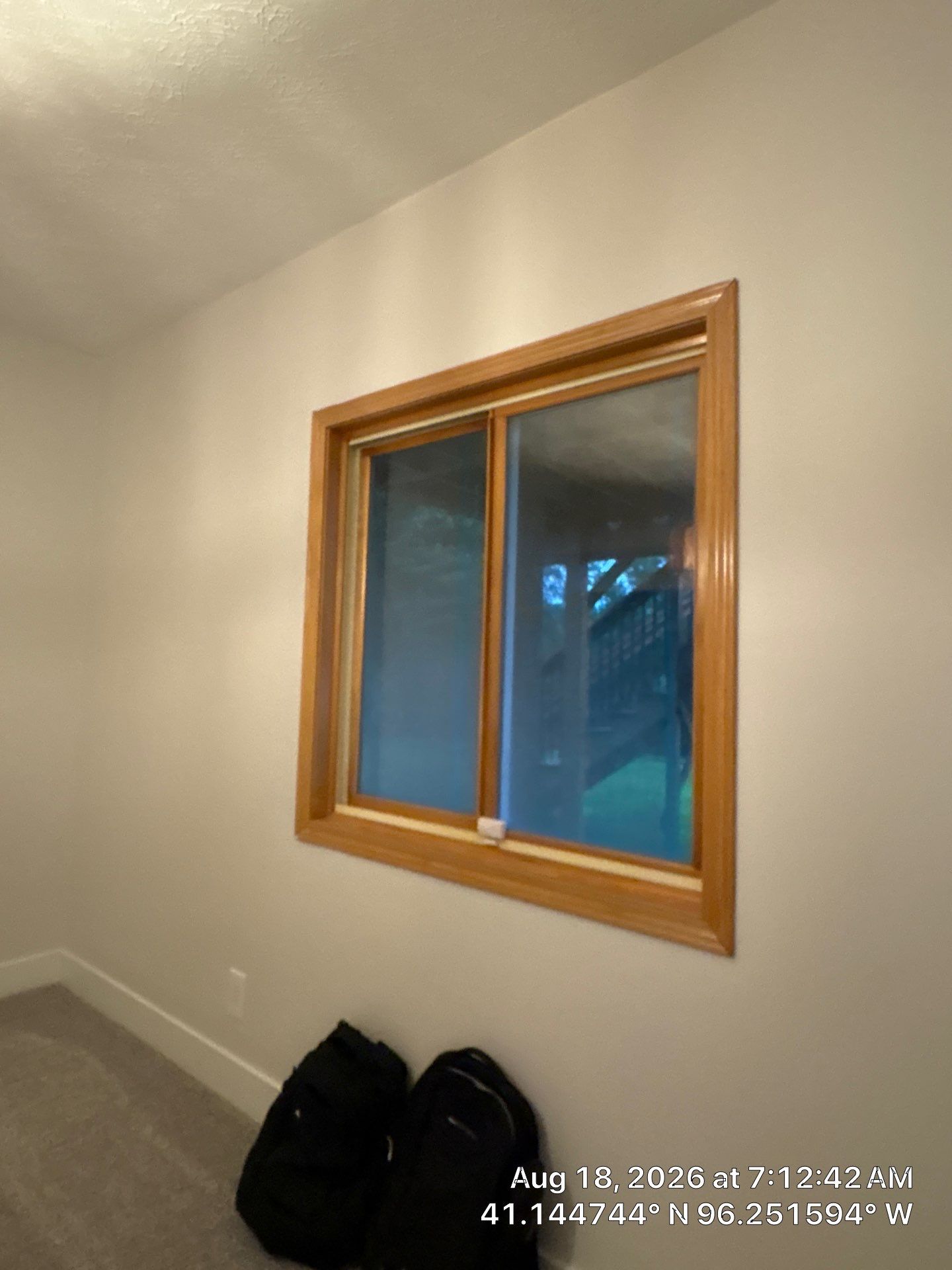 Residential Window Installation Featuring Natural Wood Frames in Gretna by CompanyCam Sales Demo
