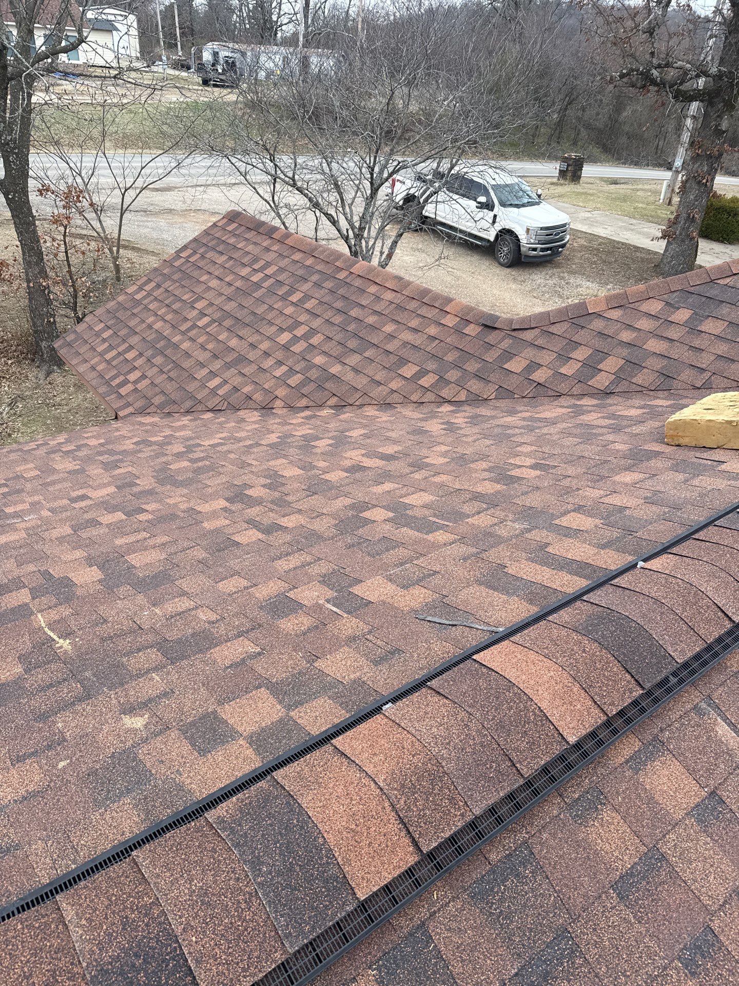 Rustic Hickory Shingles & SBS Cap & Base by In & Out Construction & Remodeling, LLC