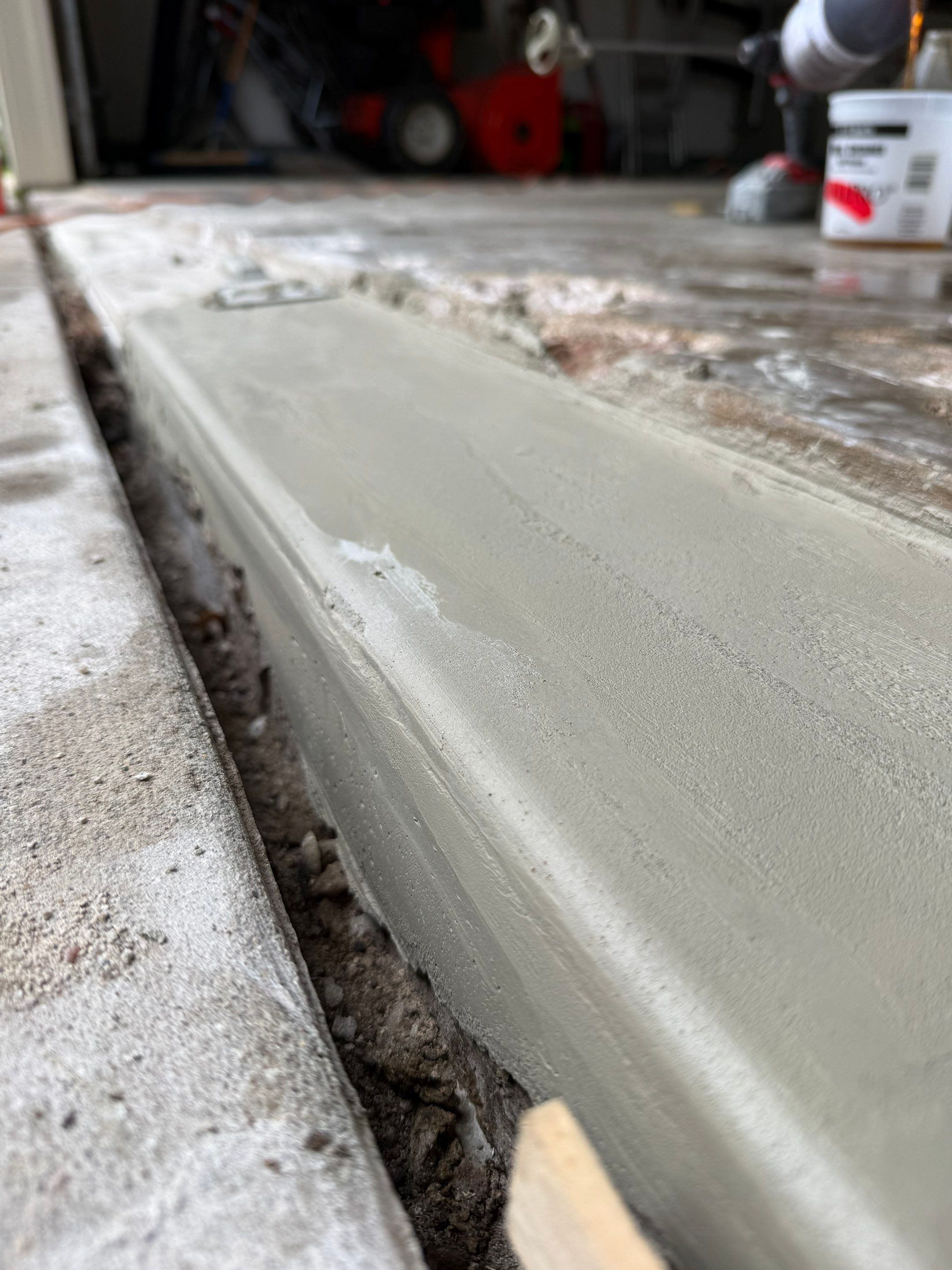 Custom Creekbed Garage Floor Coating in Sioux Falls by Select Painting, Coatings & Garage Cabinets