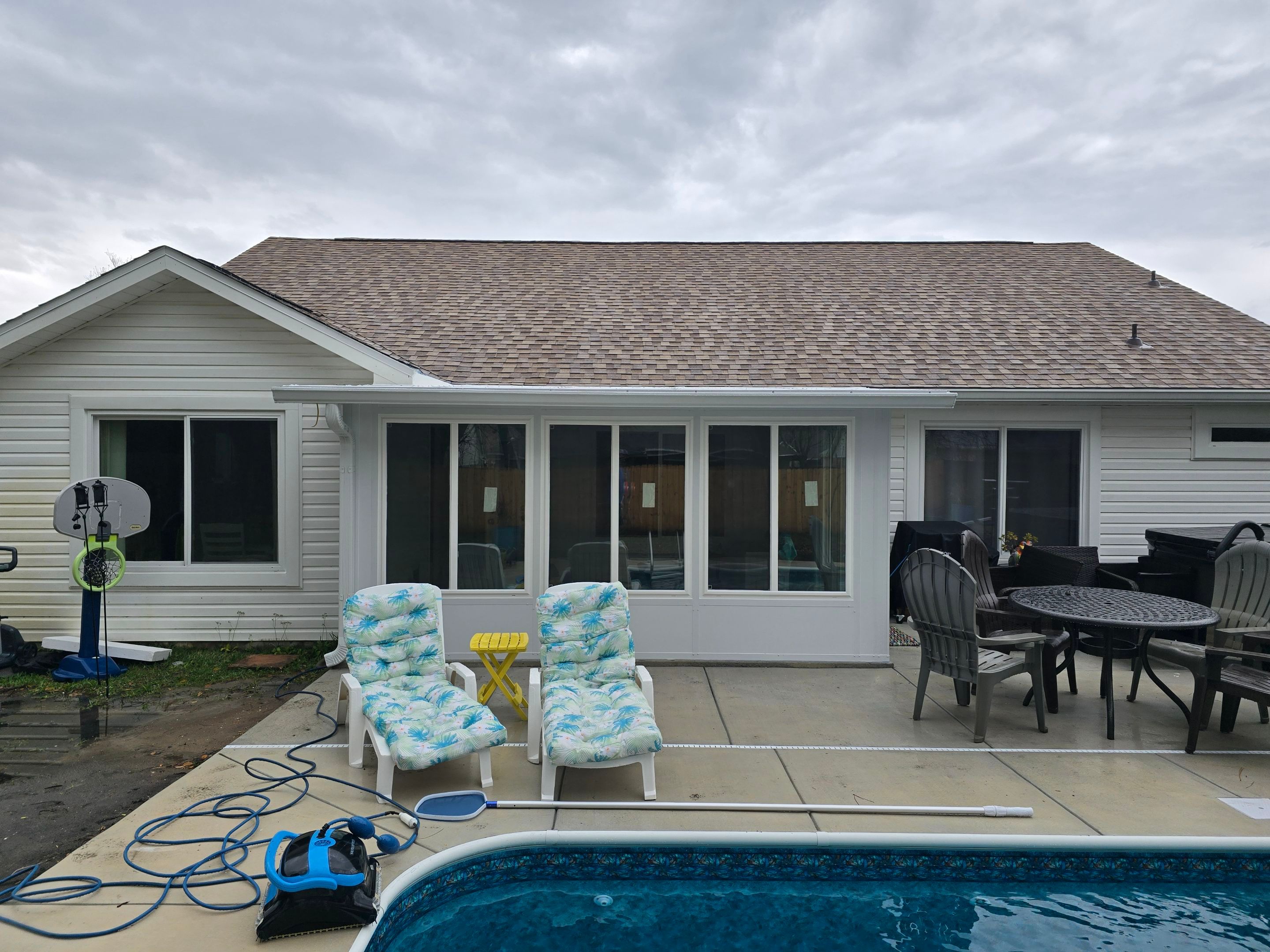 Poolside Glass Room in Gulf Breeze by Titan Sunrooms