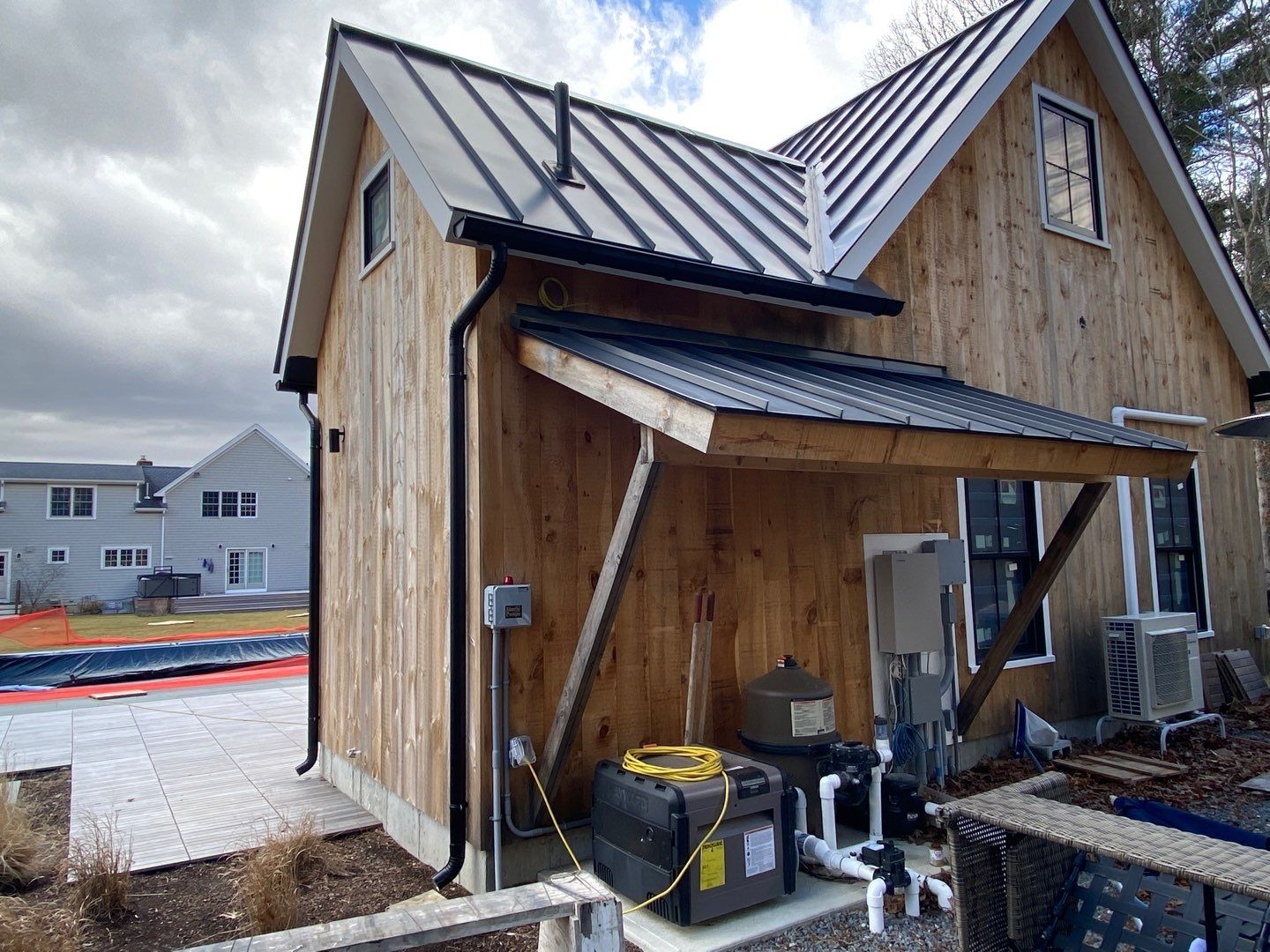 Gutter Installation using Black Half Round Aluminum Gutter in Lakeville, MA by Gutter Pro Enterprises
