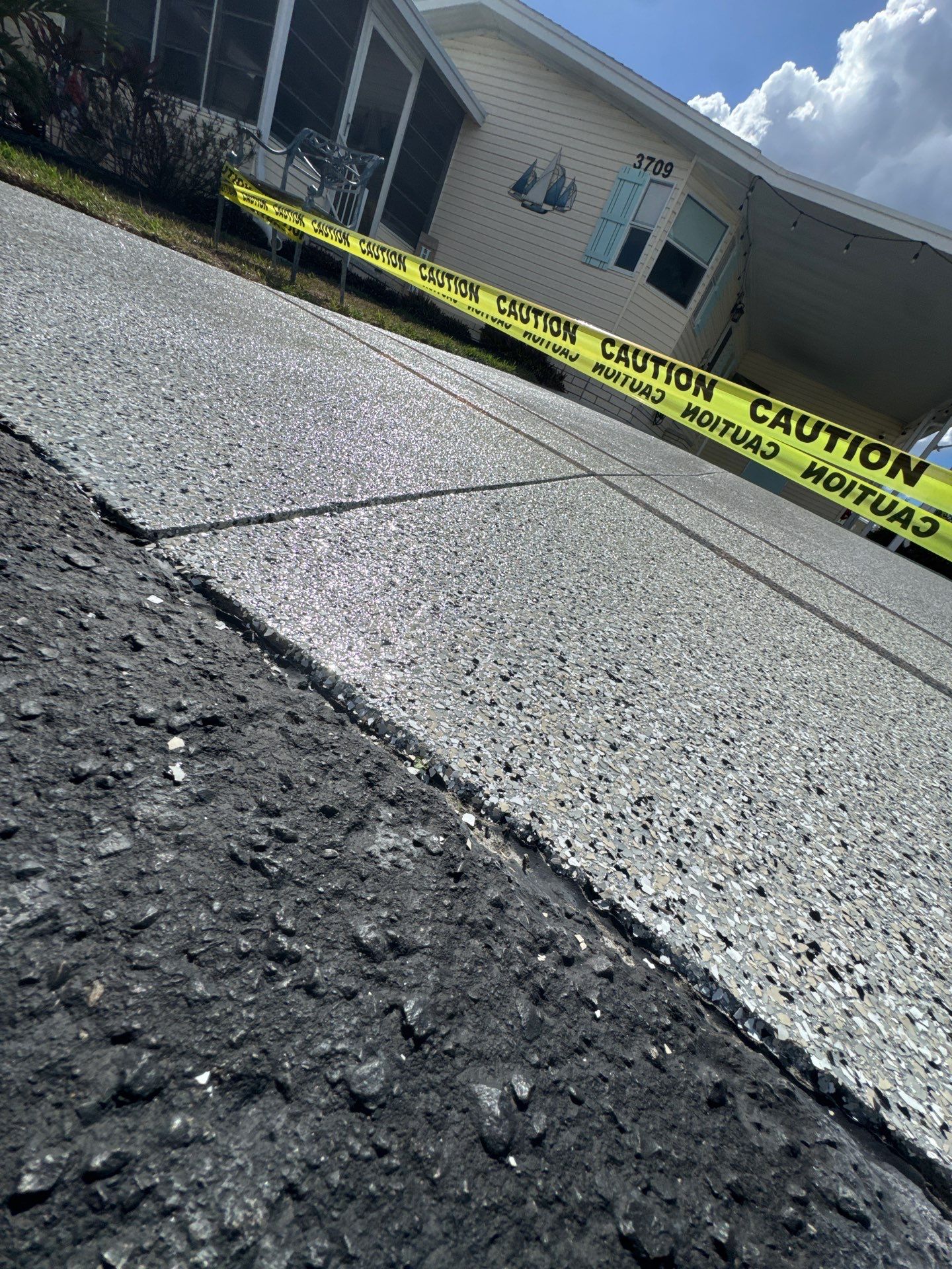 Ultimate Curb Appeal: Cabin Fever Driveway Overhaul by Performance Floors & Coating