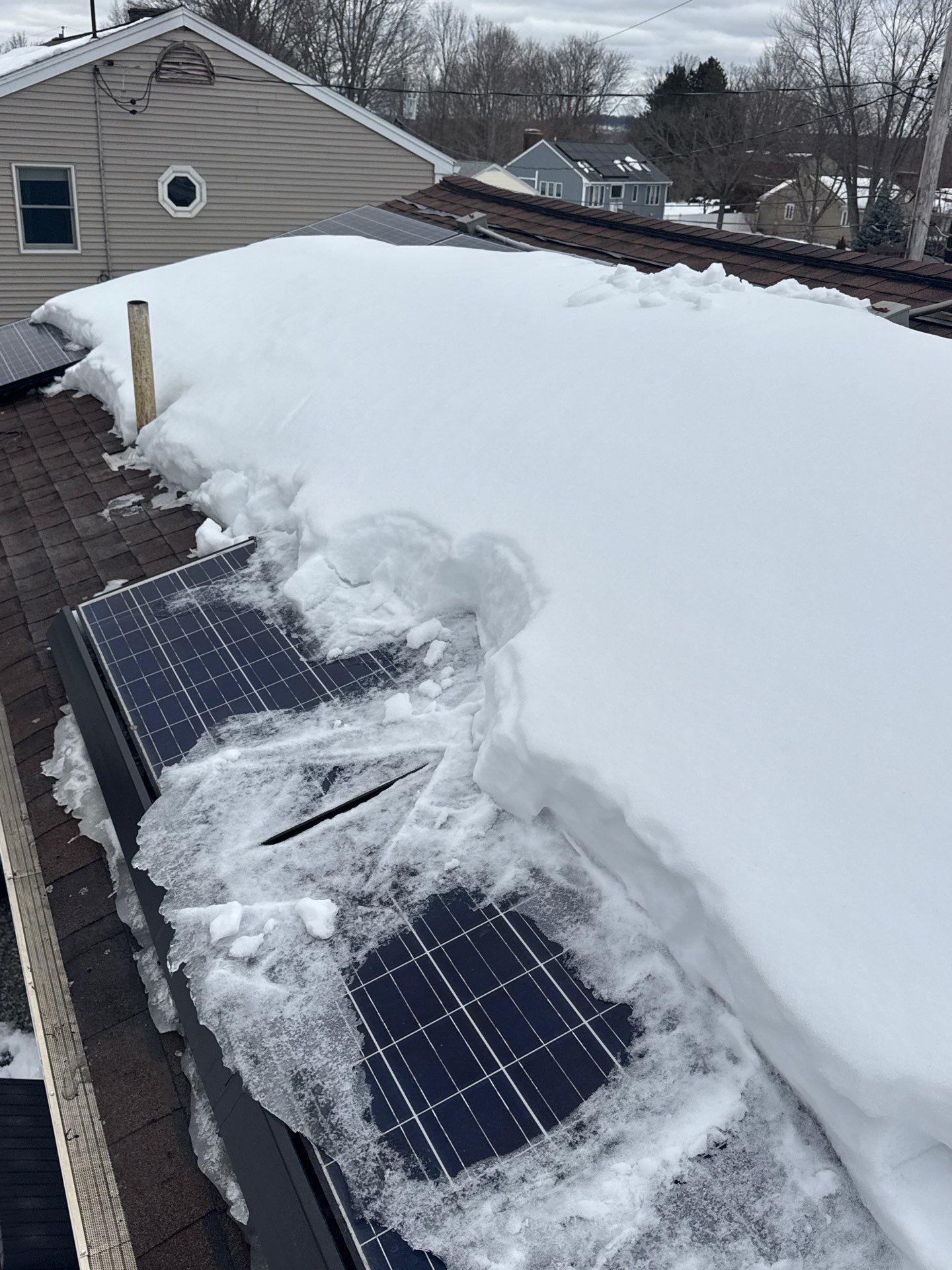 Ice Dam Removal & Snow Removal in Woburn, MA by Mighty Dog Roofing of Greater Middlesex County