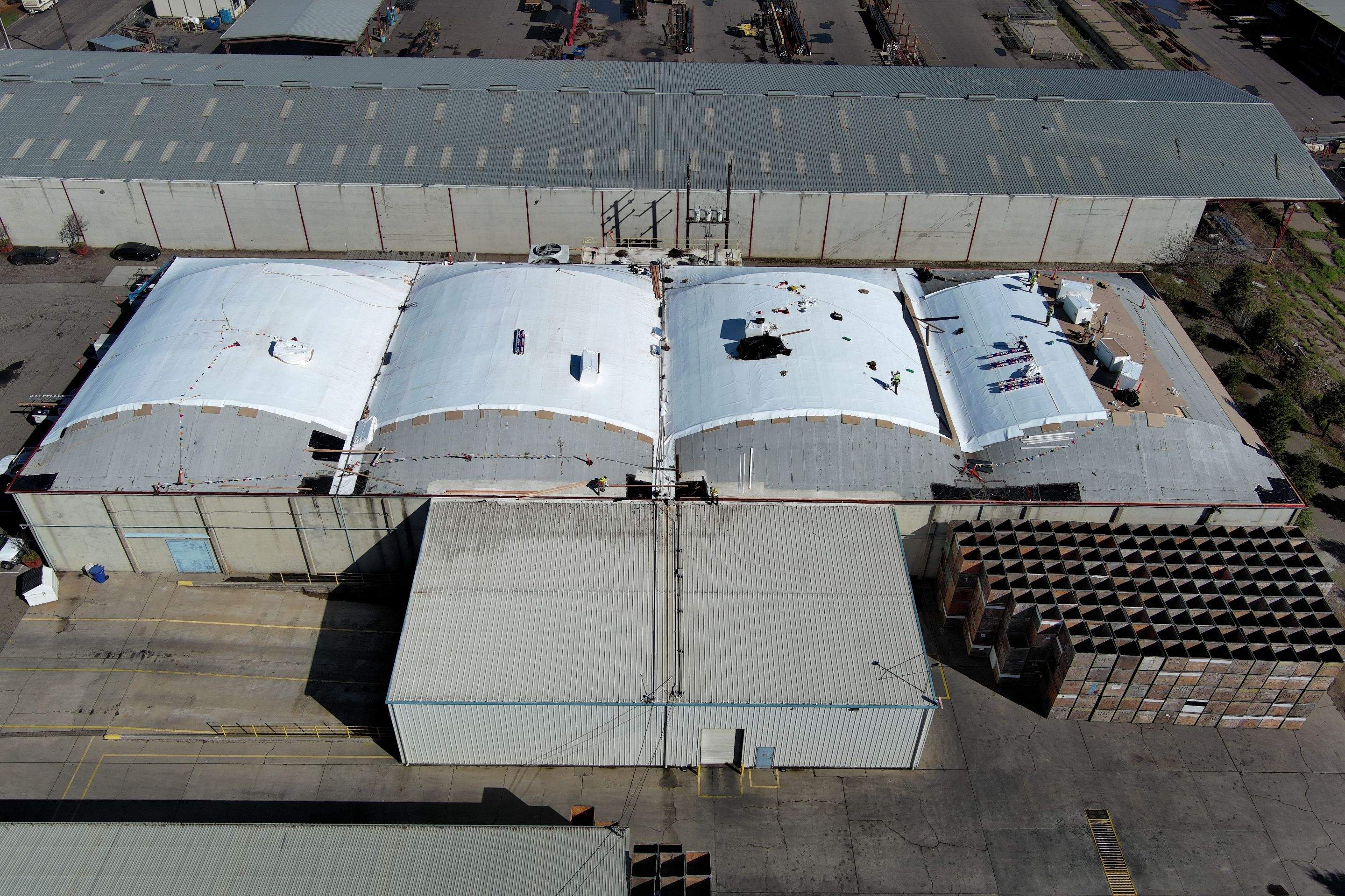 TPO single-ply roofing system using GAF Single-ply TPO 60 mil with 1.5 inch ISO board insulation by Straight Edge Roofing Inc