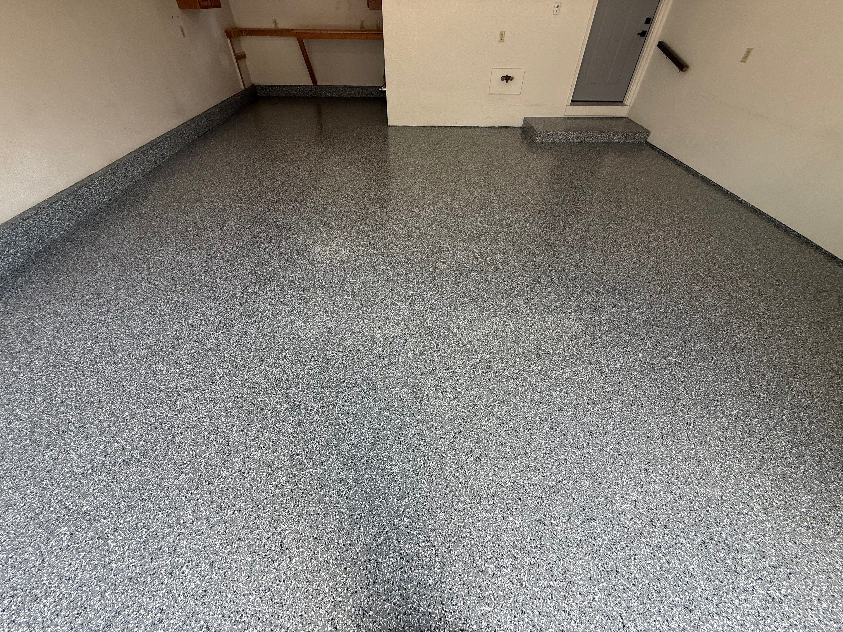 Smoke Flake Garage Floor Coating in Dell Rapids by Select Painting, Coatings & Garage Cabinets