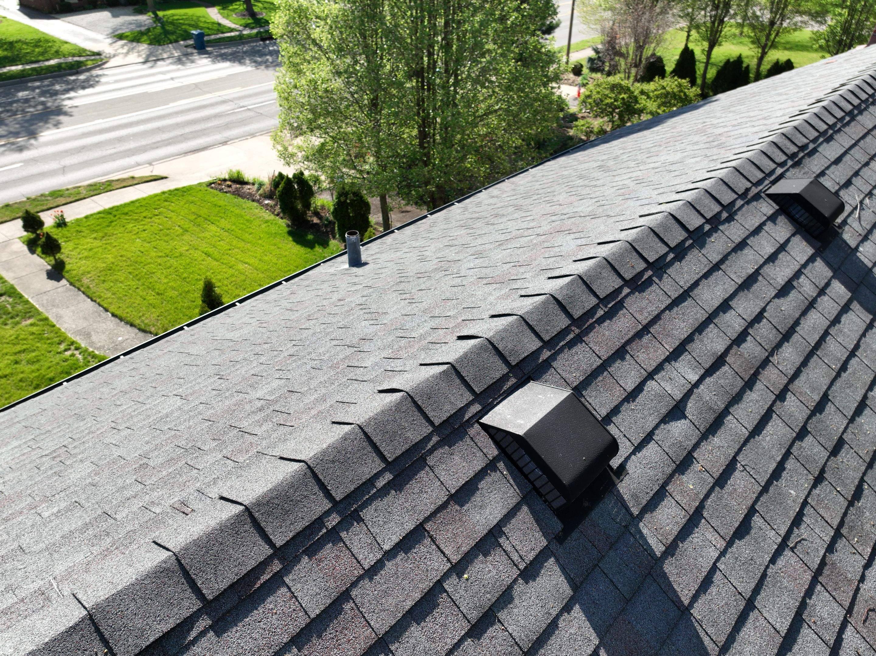 Oakridge Onyx Black and Black Gutters by 317 Roofing & Restorations