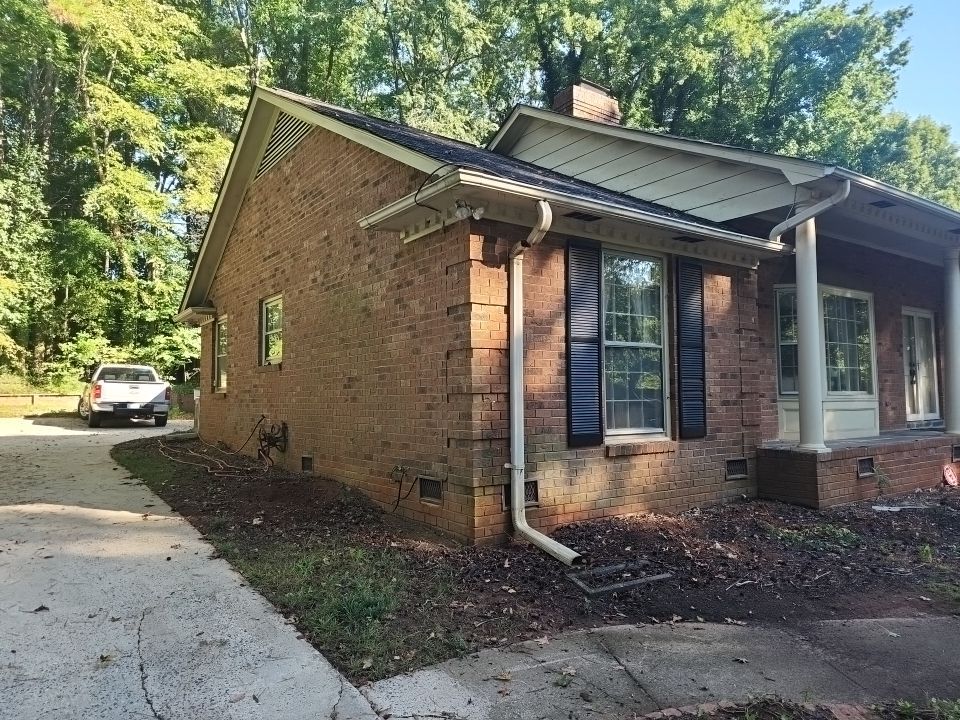 House Wash using cleaner by Power Wash Masters LLC