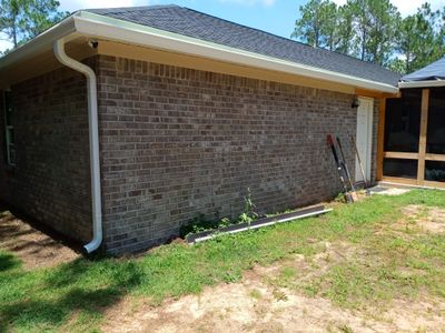 Downspout Installation using White Down Spouts in Milton FL