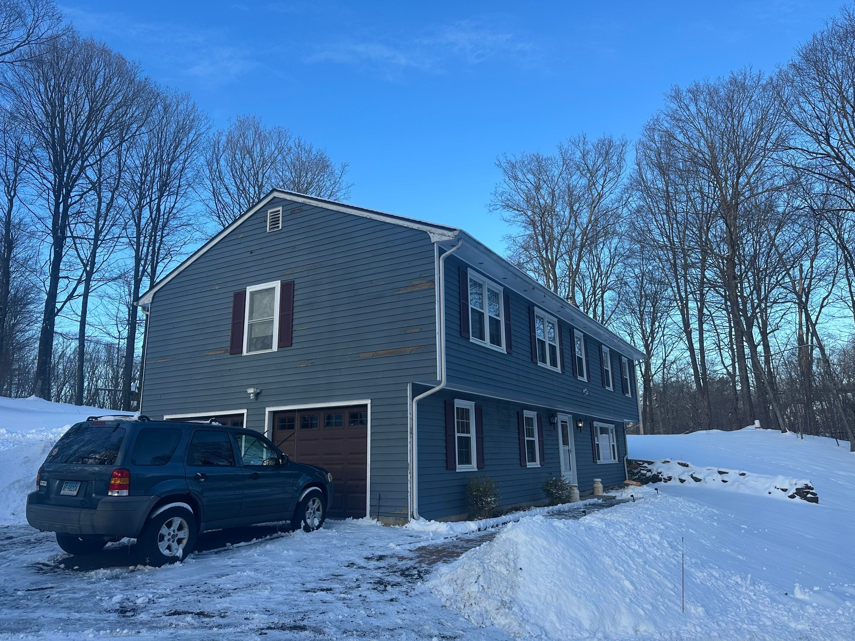 Siding Installation using CertainTeed Mainstreet Vinyl Siding - Pacific Blue by A Plus Exterior