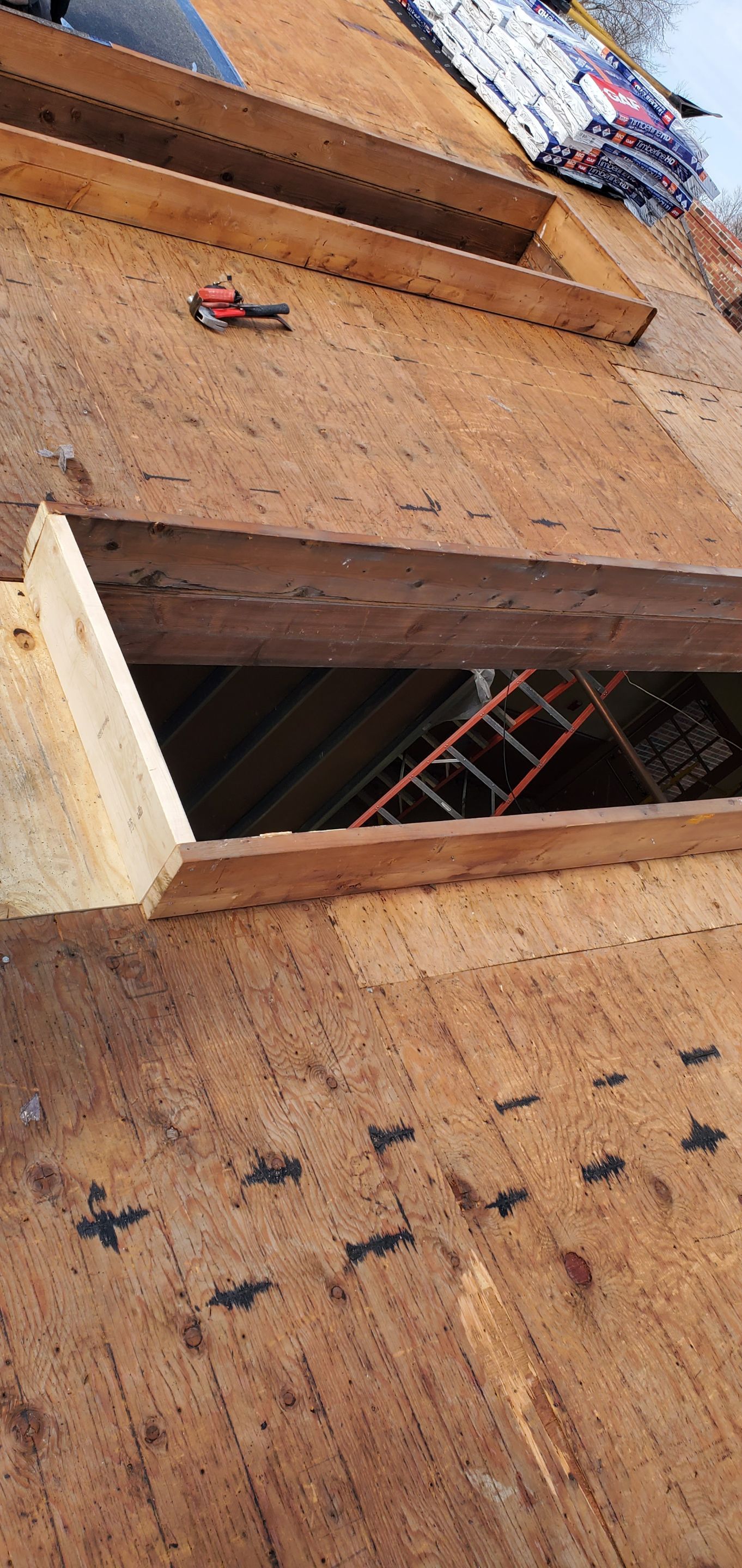 Skylight removal and install  by Absolute Roofing and Construction