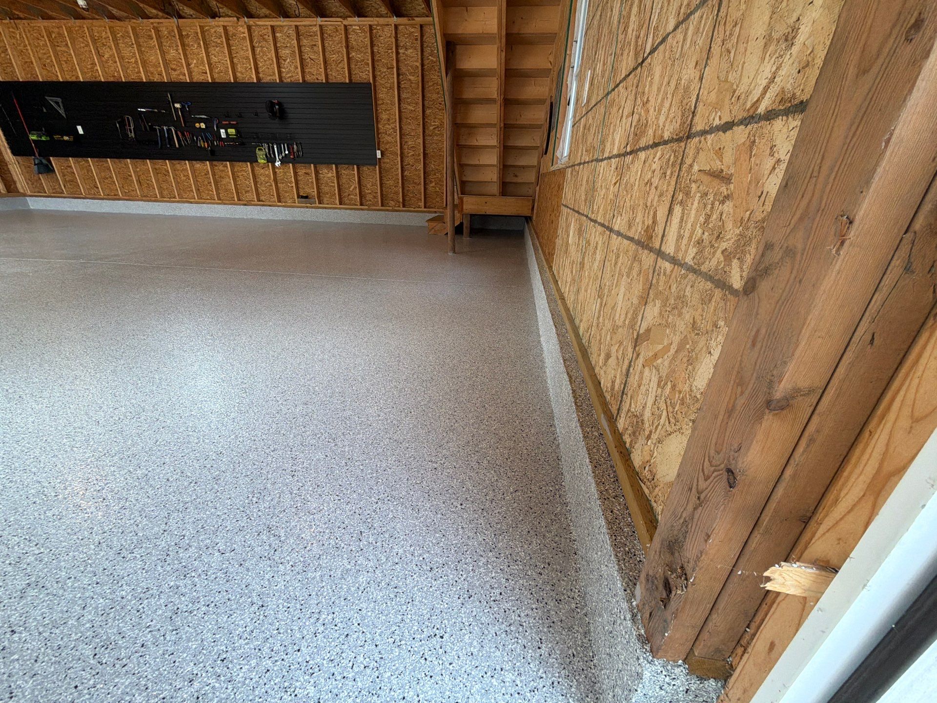 Custom Epoxy Flake Garage Floor Installation in Norton Shores by Gordon Painting