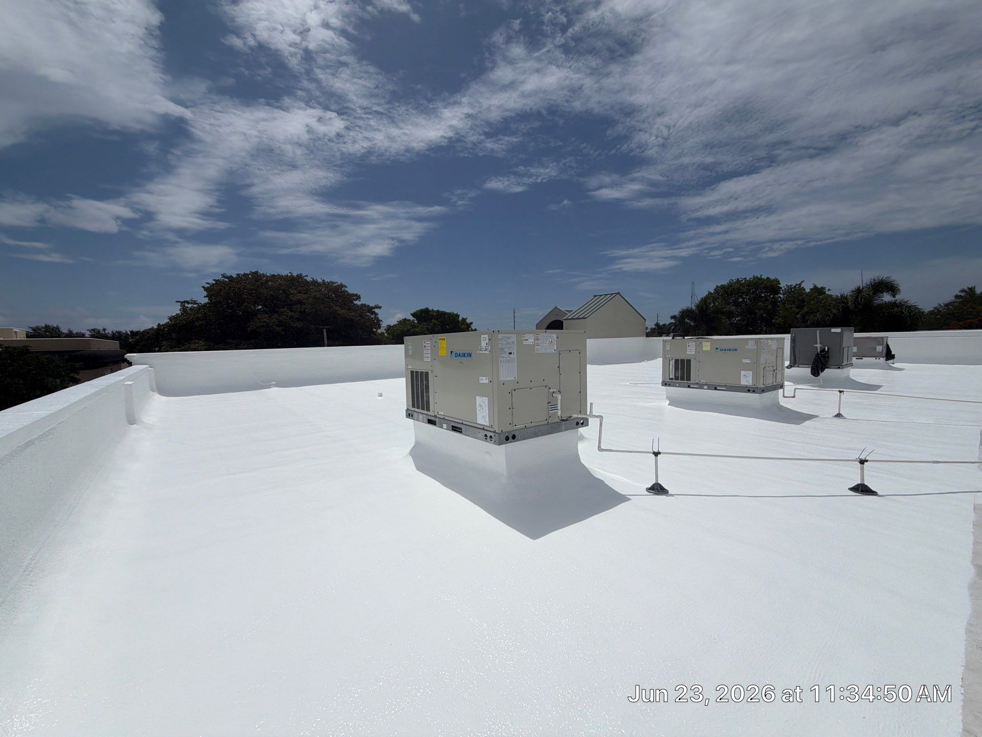 Commercial Flat Roof Restoration and Elastomeric Waterproofing in Delray Beach by Roof King LLC