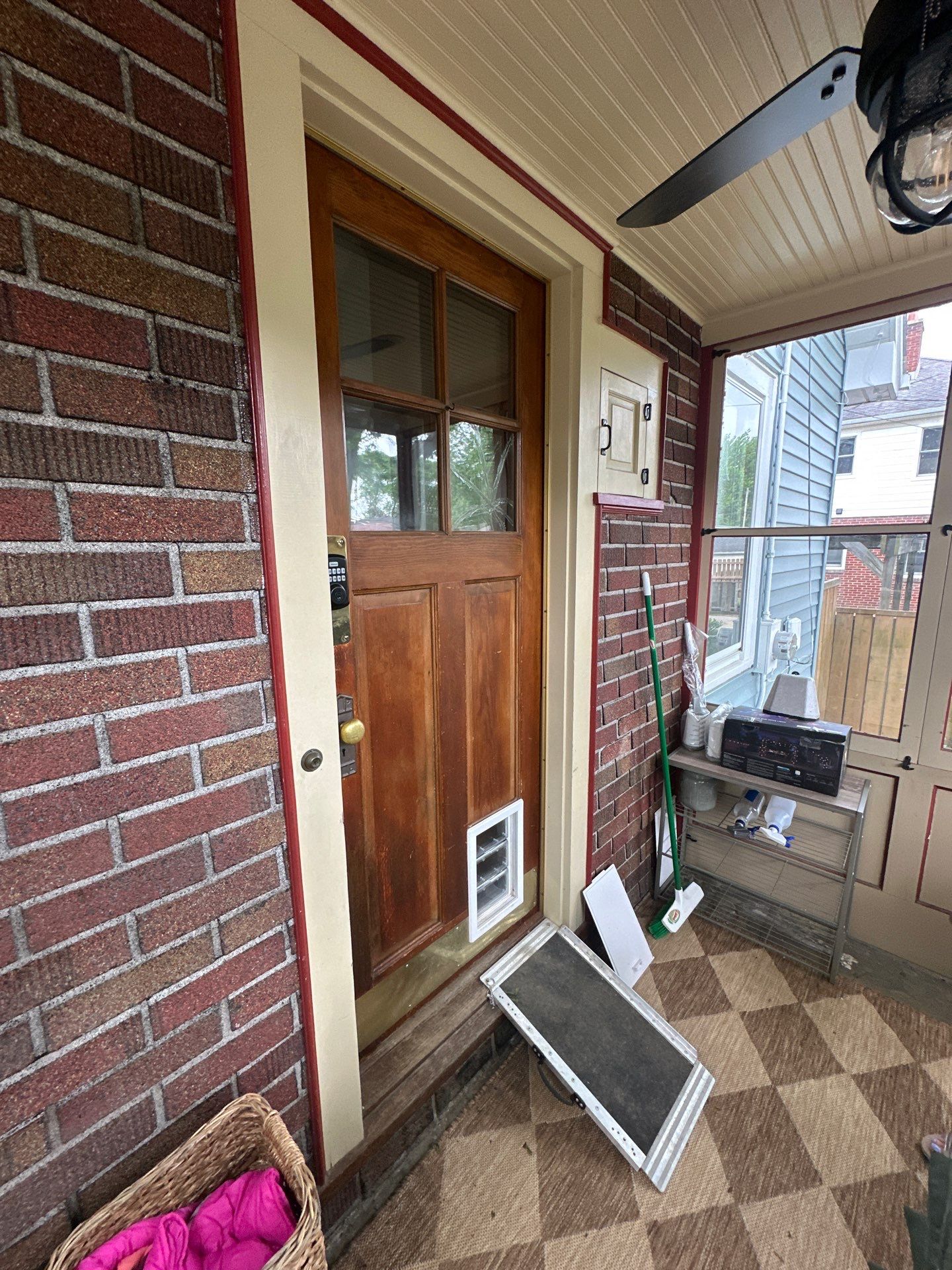 Exterior Porch Restoration and Privacy Fence Staining in Wauwatosa by OCS Contracting Services