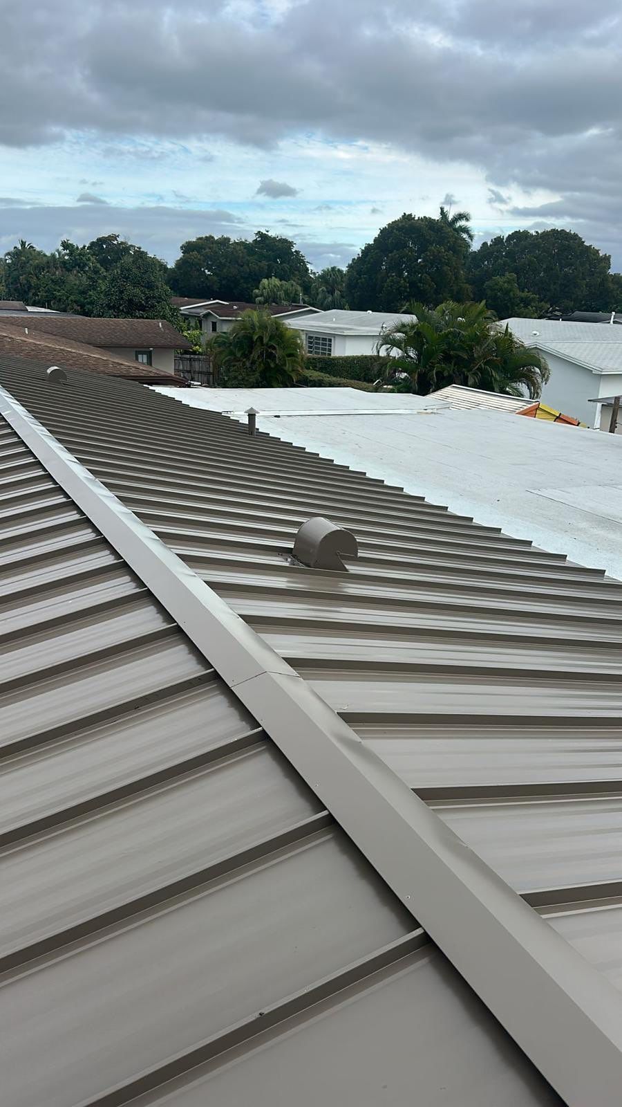 Residential Roofing Installation using Metal Roof  by City Roofing Inc