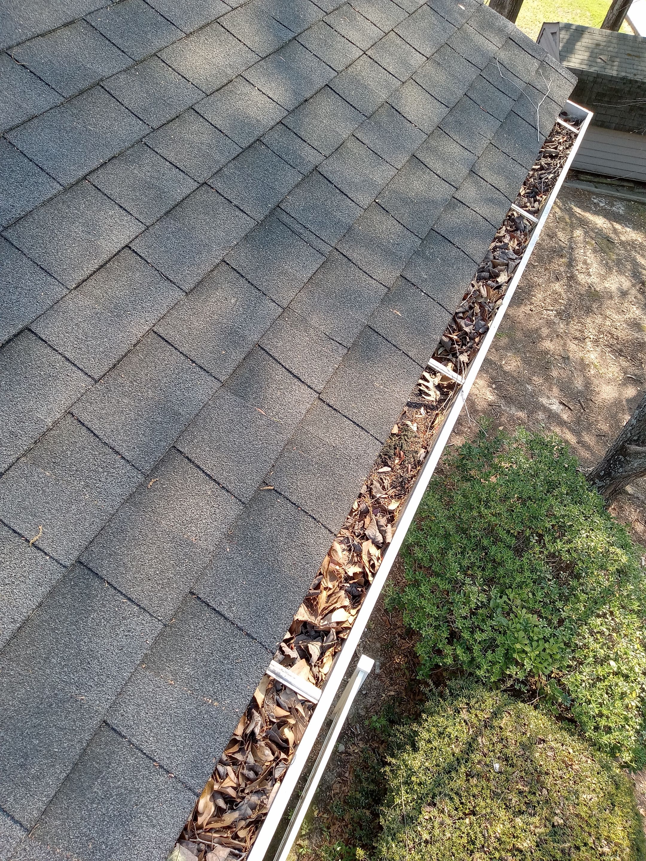 Commercial gutter cleaning South Carolina before photo with filled gutters