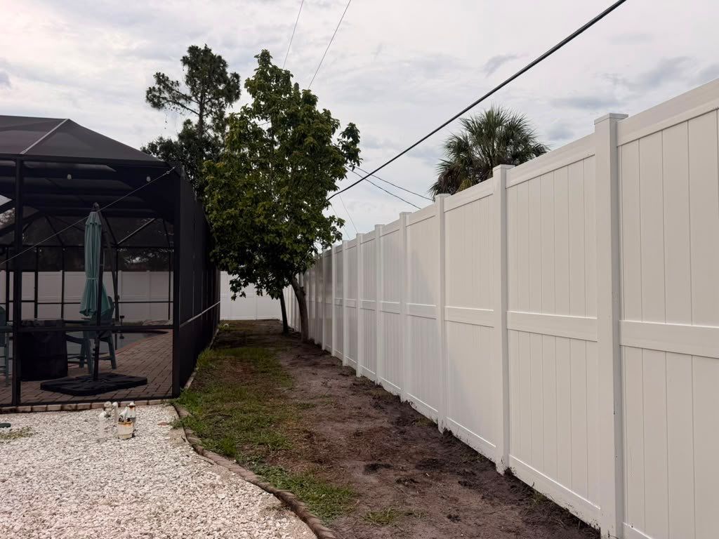 8'H White Vinyl Privacy Fence Installation in North Port by True Fence LLC