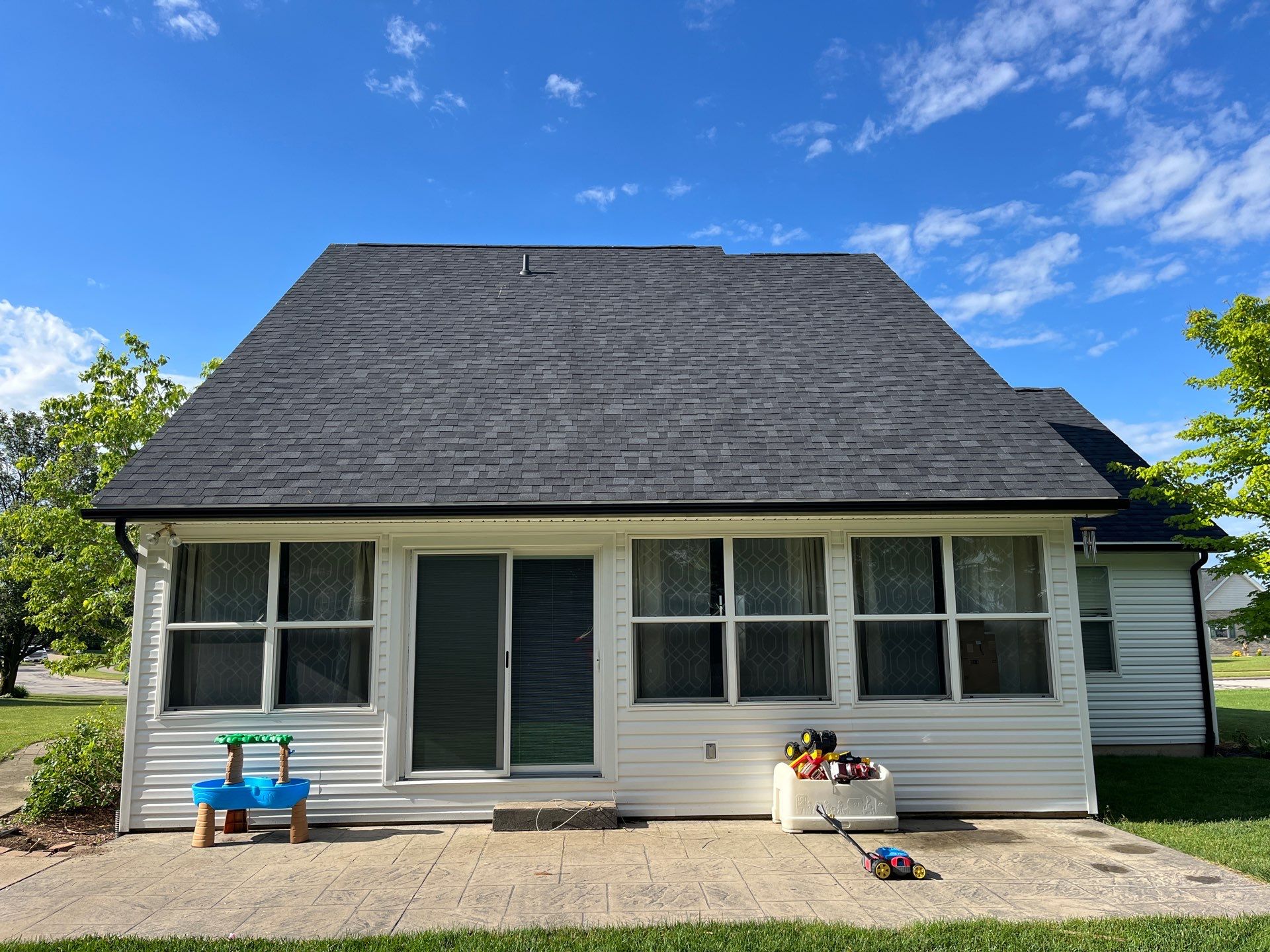 Exterior Installation using Onyx Black Durations and White Siding by WIW Enterprises Inc