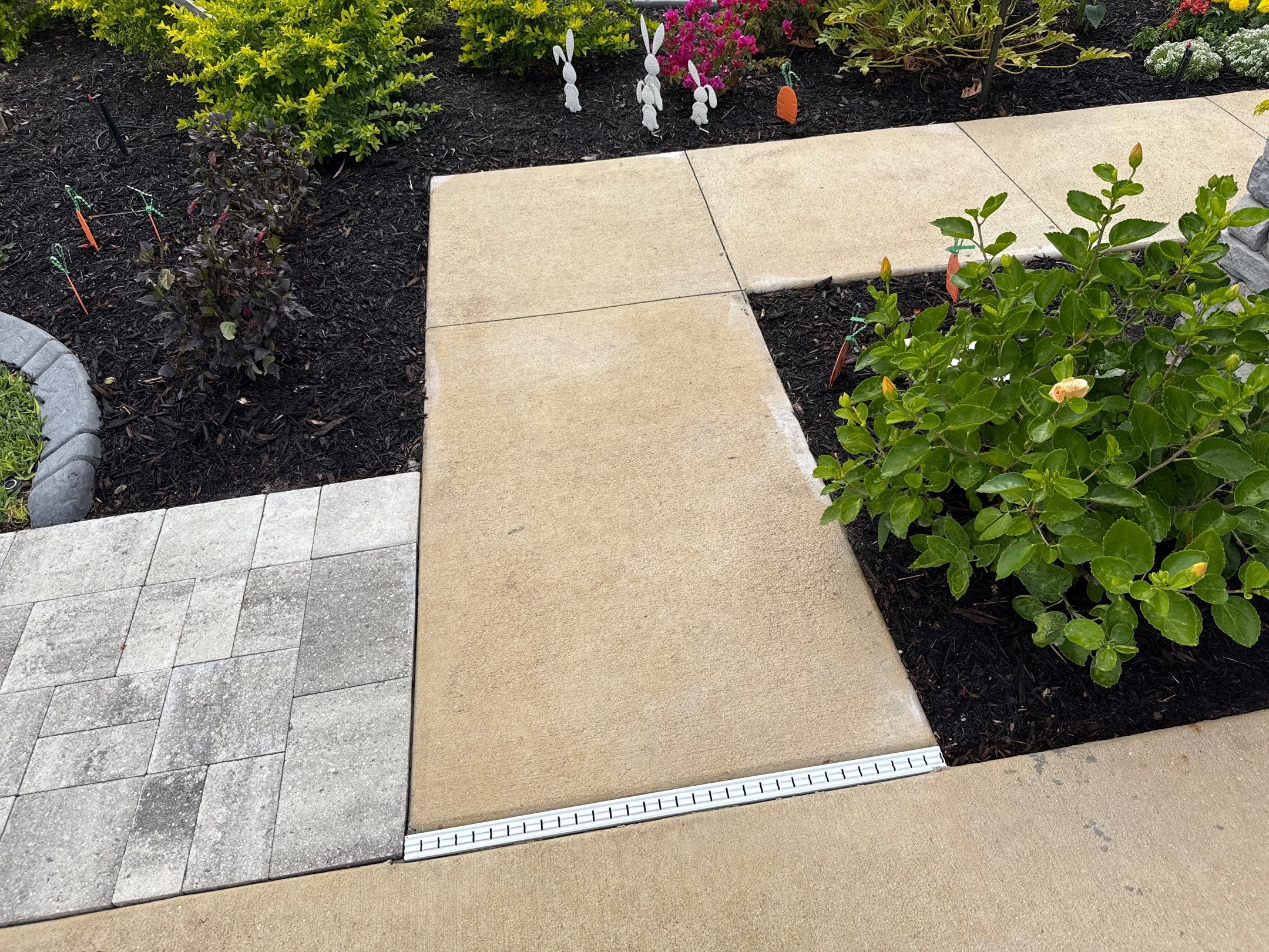 Rust Stain Removal from Concrete Driveway and Pavers in Park East at Azario | Lakewood Ranch, FL by Sunshine AquaWash