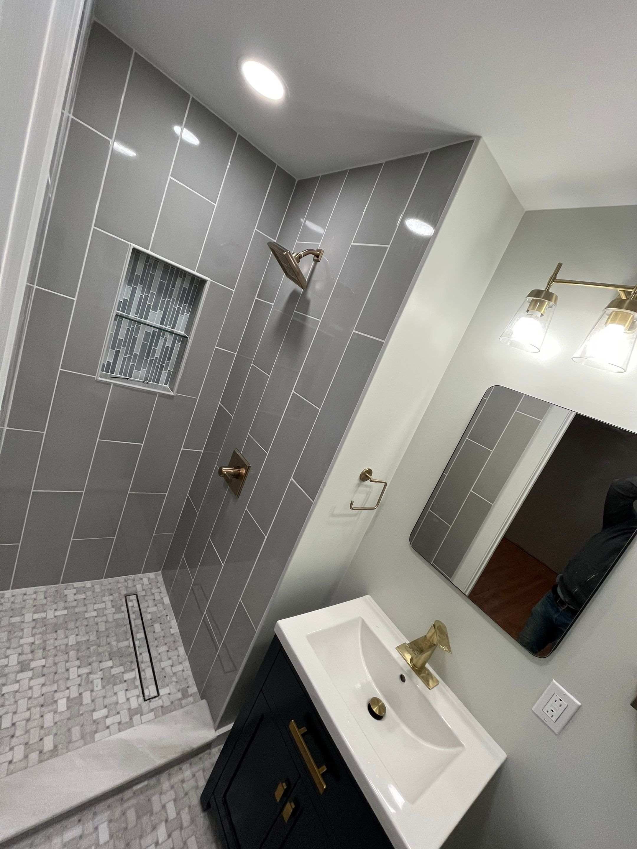 Bathroom Remodel using Tile by Home Concepts Construction
