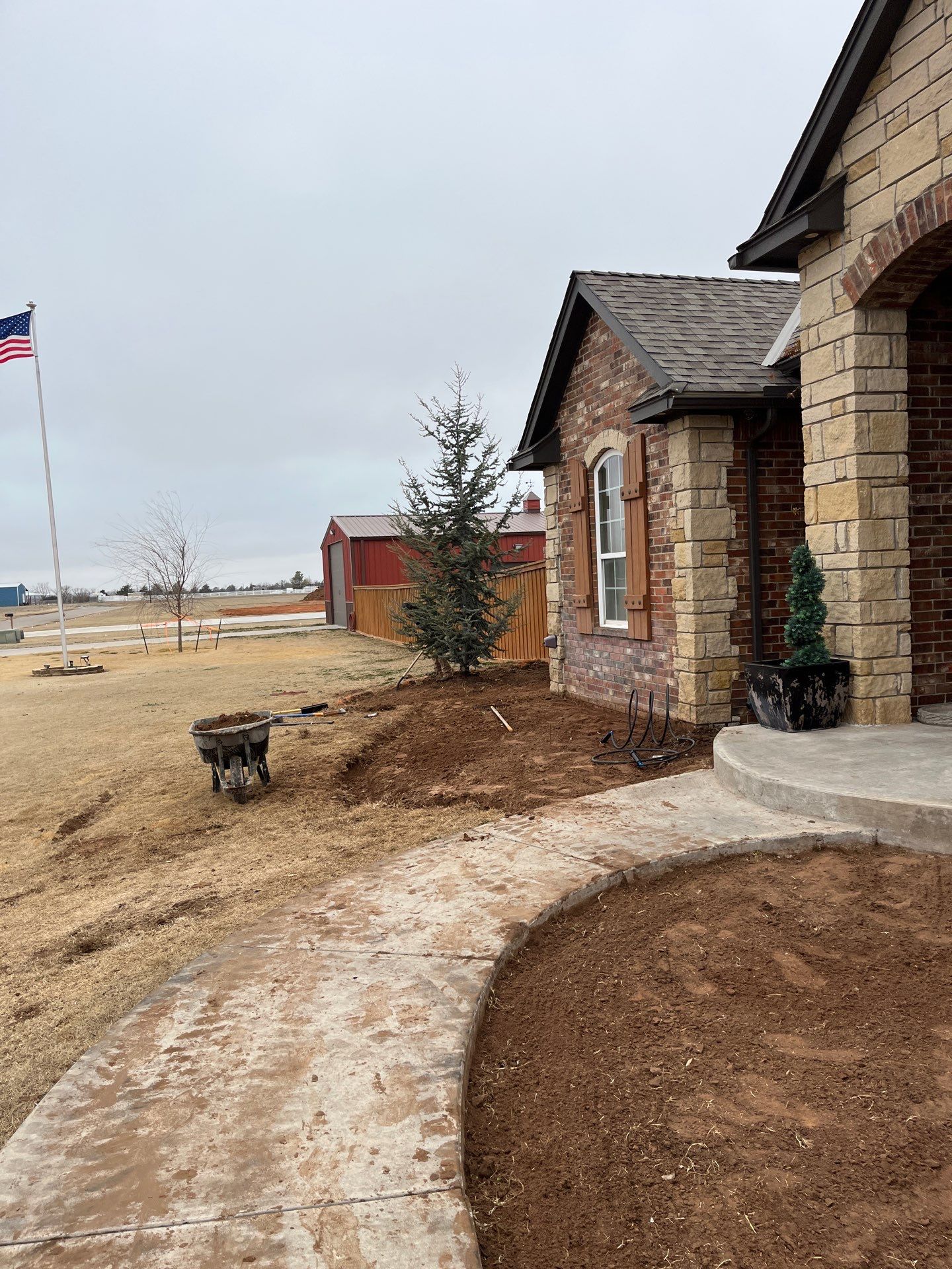 Landscape installation w/ irrigation and landscape lighting by Clays Services Inc